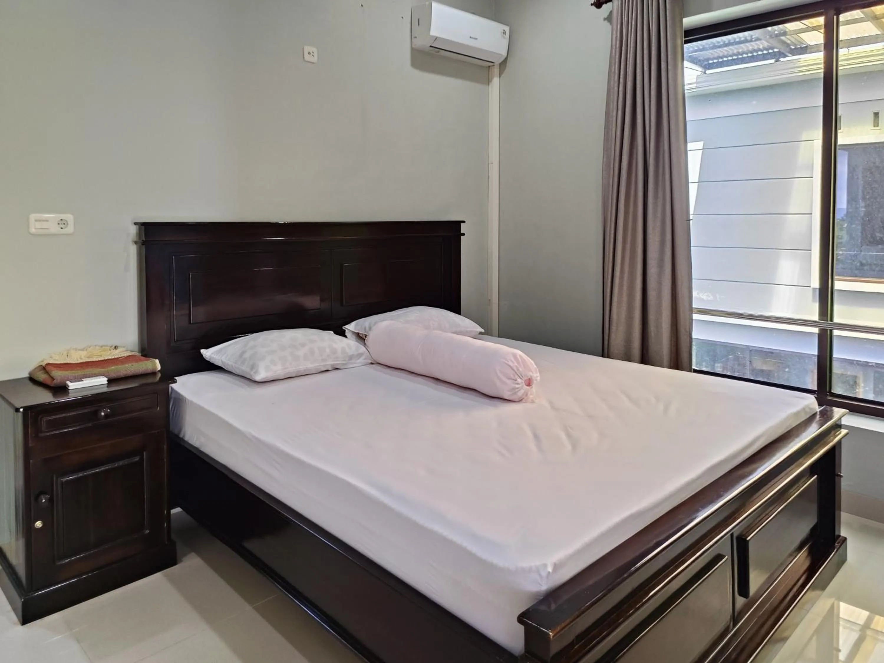 Bed in RedDoorz @ Green Homestay Syariah Baubau