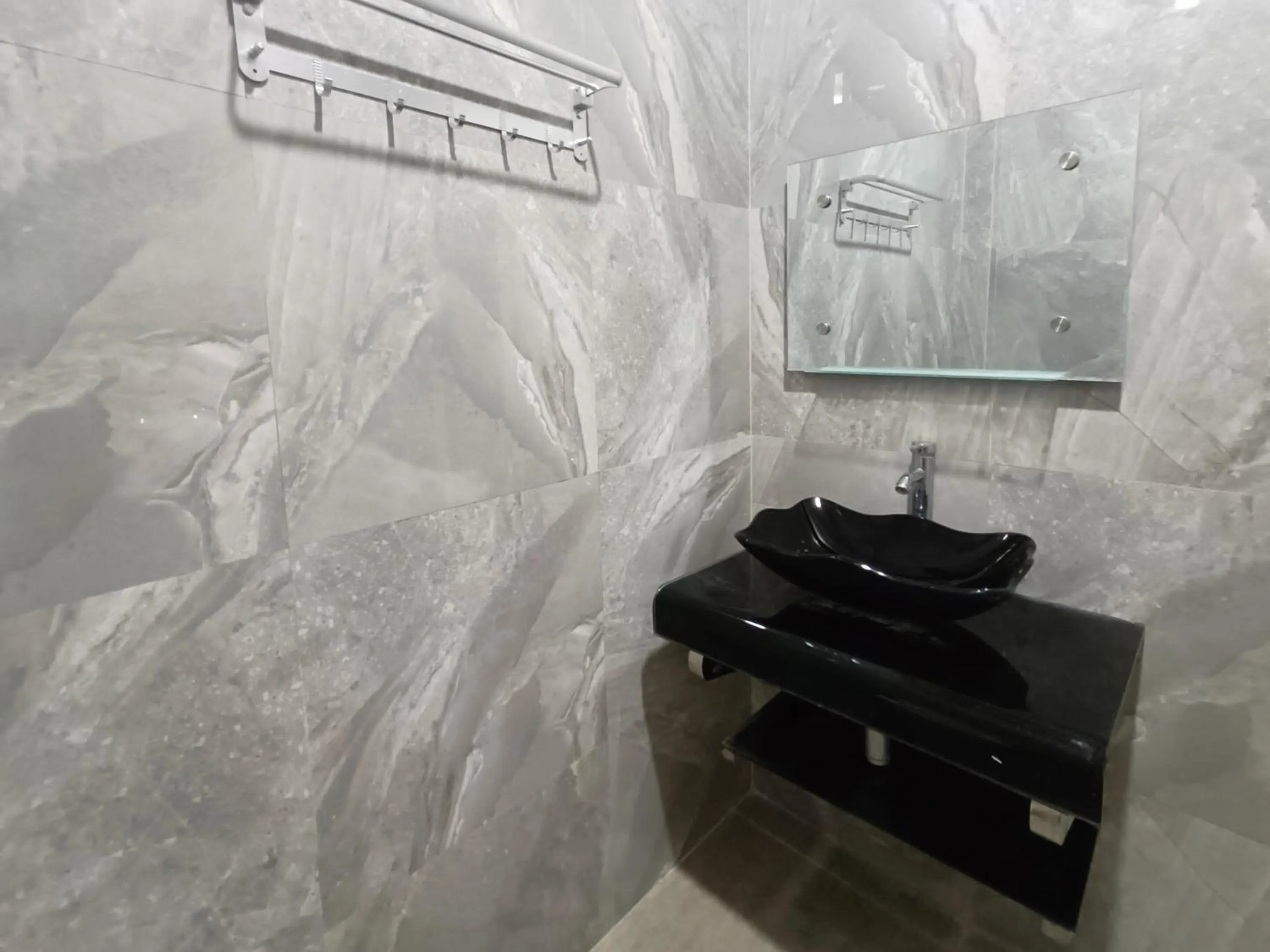 Bathroom in RedDoorz @ Green Homestay Syariah Baubau