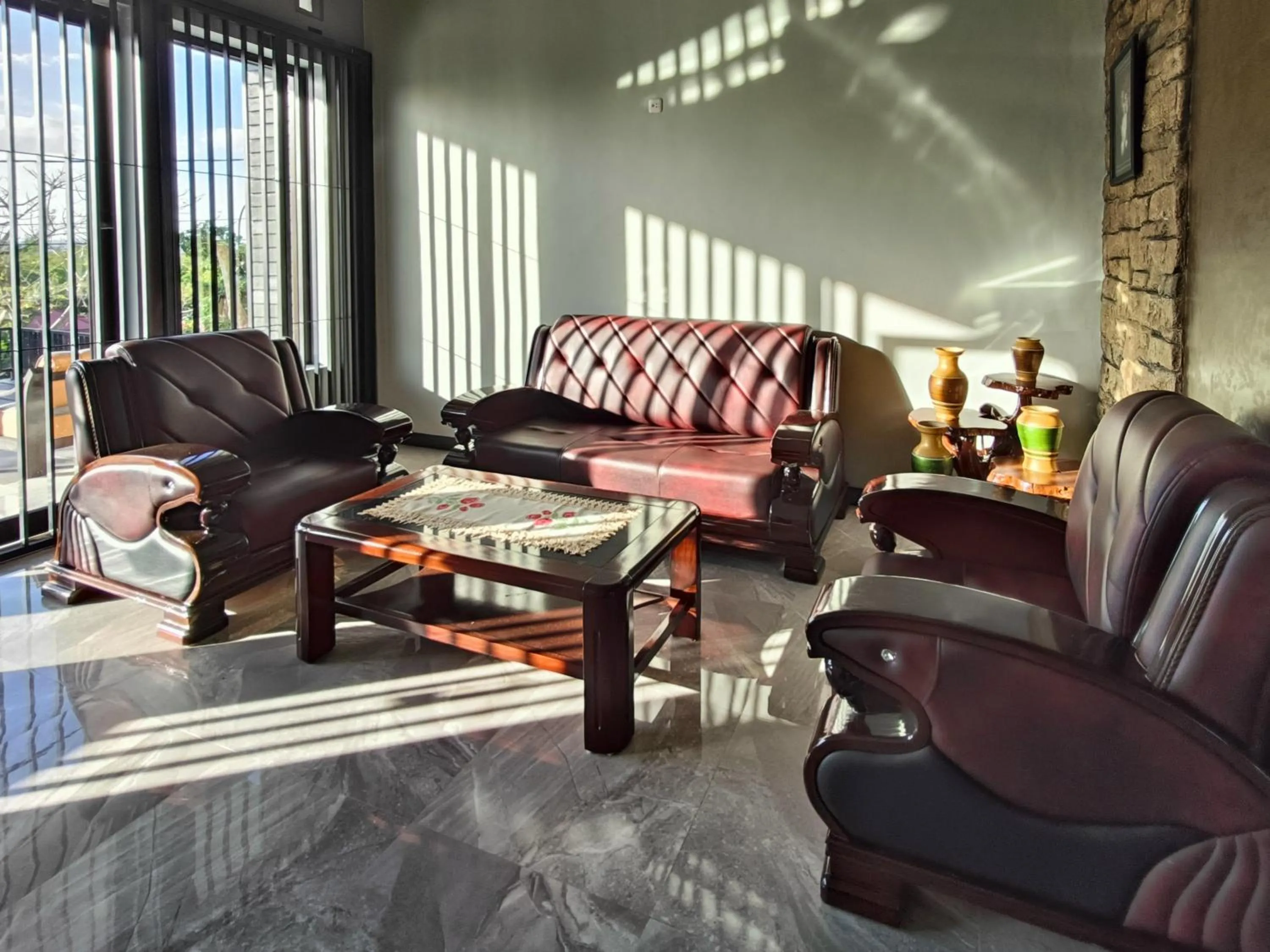 Seating area in RedDoorz @ Green Homestay Syariah Baubau