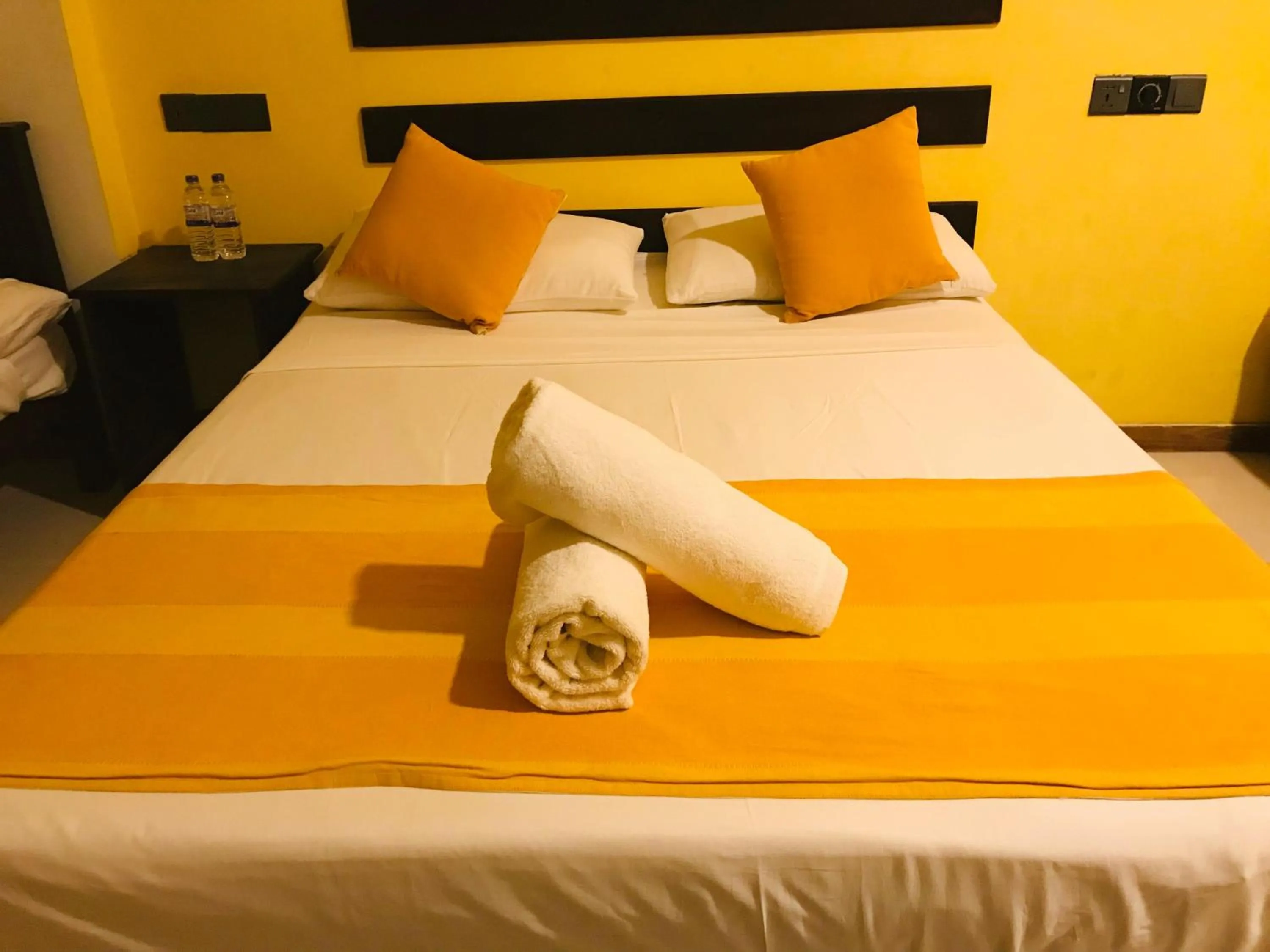Bed in AMRON RESORT SIGIRIYA