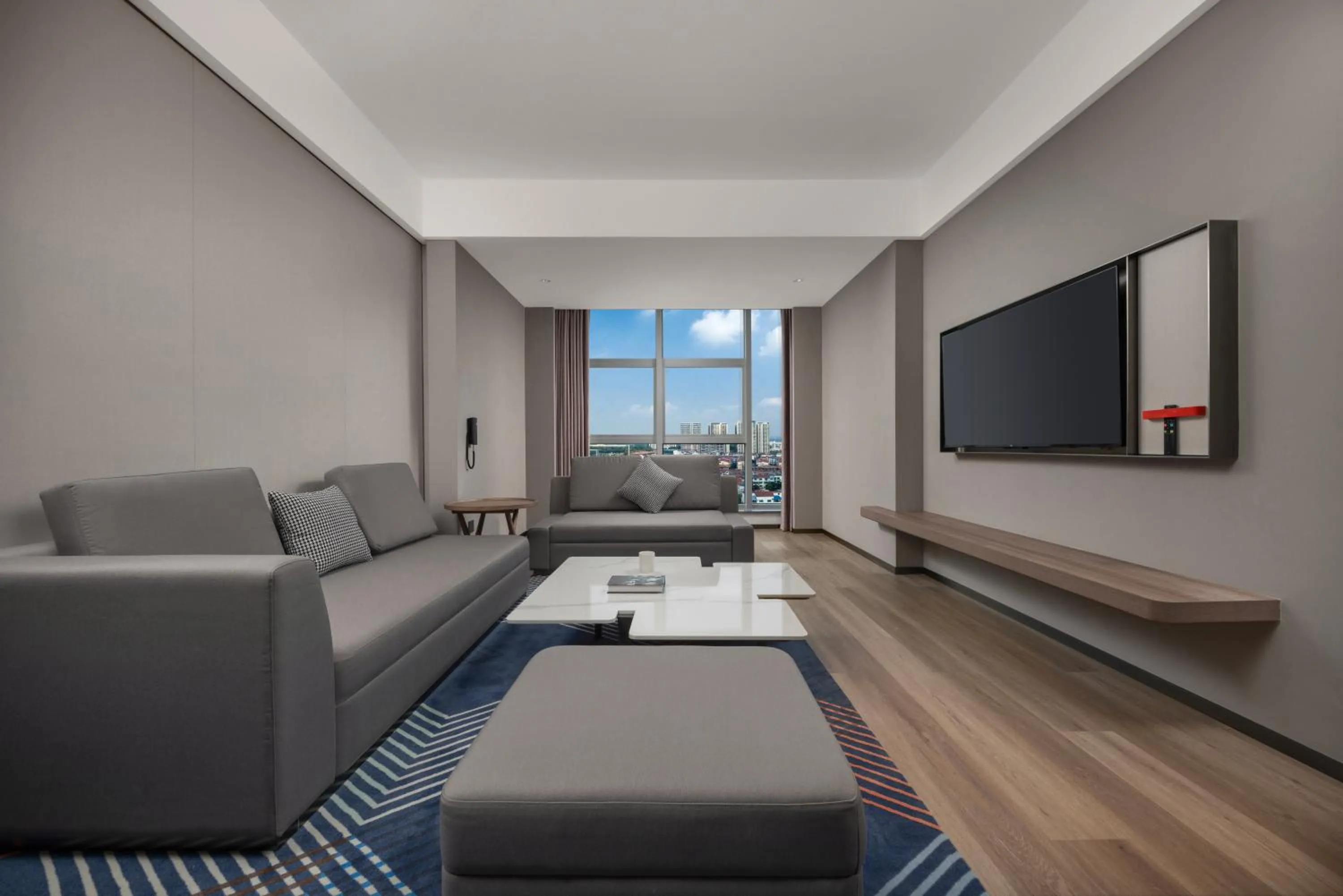 Living room in Holiday Inn Express Mianyang Sci-Tech City by IHG