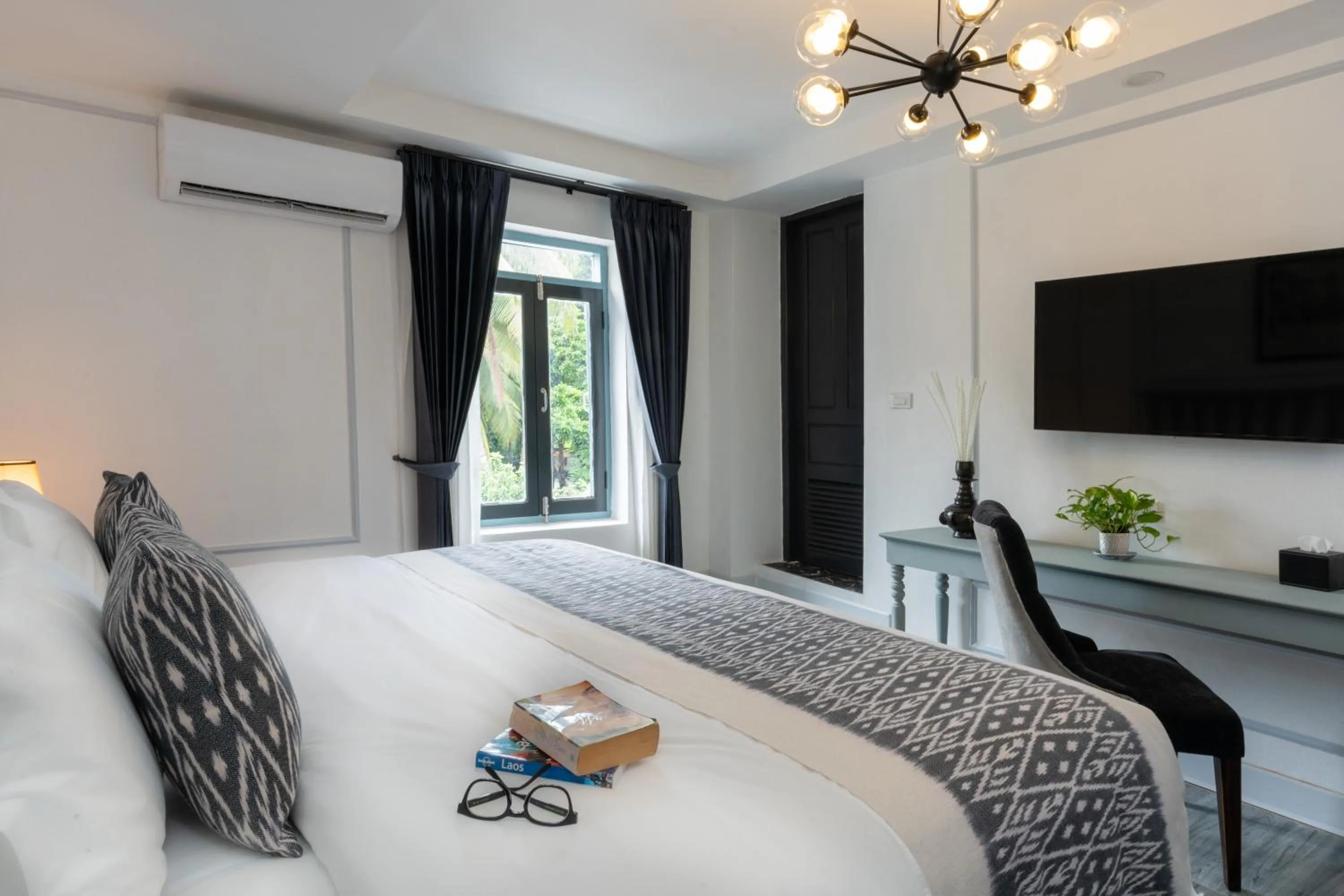 Bed in Luangprabang D'or Boutique Hotel