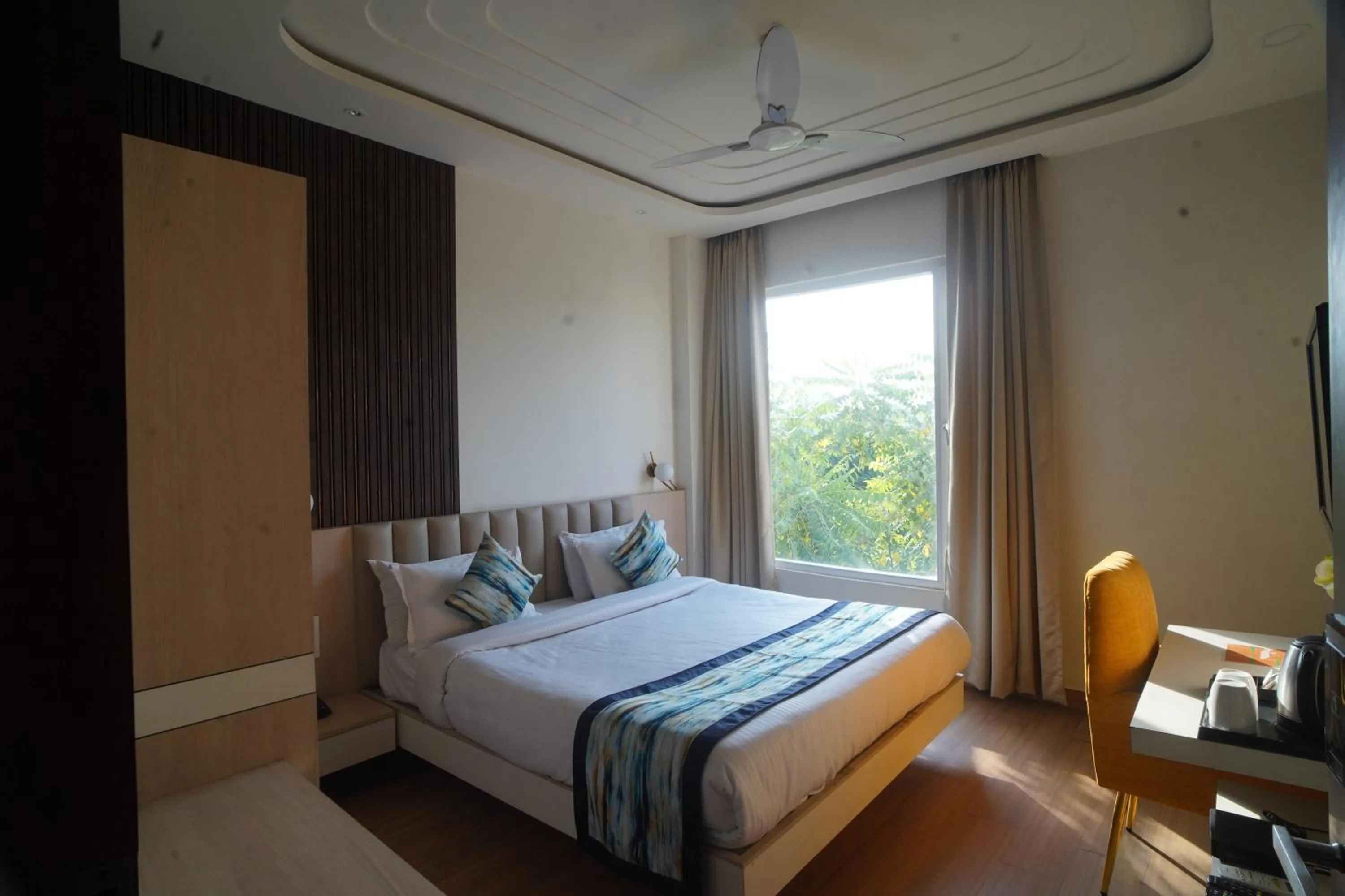 Bed in Familia Hotel and Banquets