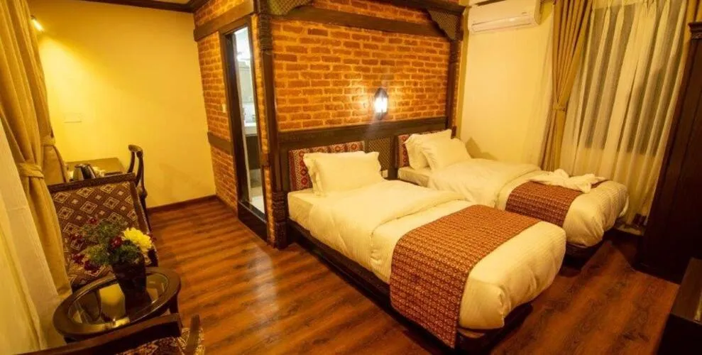 Bed in Pashupati Boutique Hotel & Spa