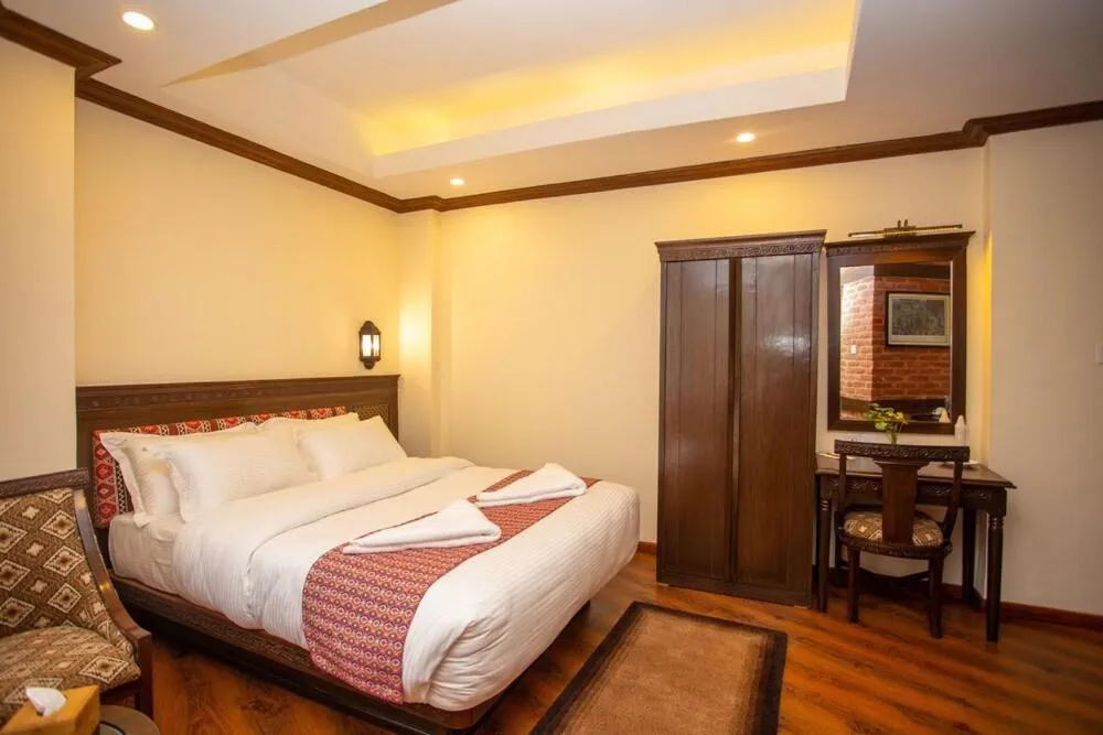 Bed in Pashupati Boutique Hotel & Spa