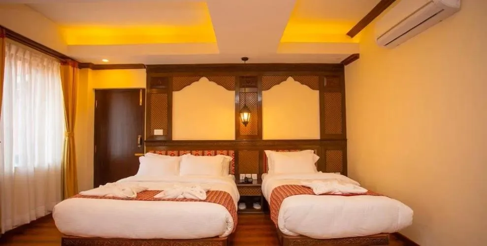 Bed in Pashupati Boutique Hotel & Spa