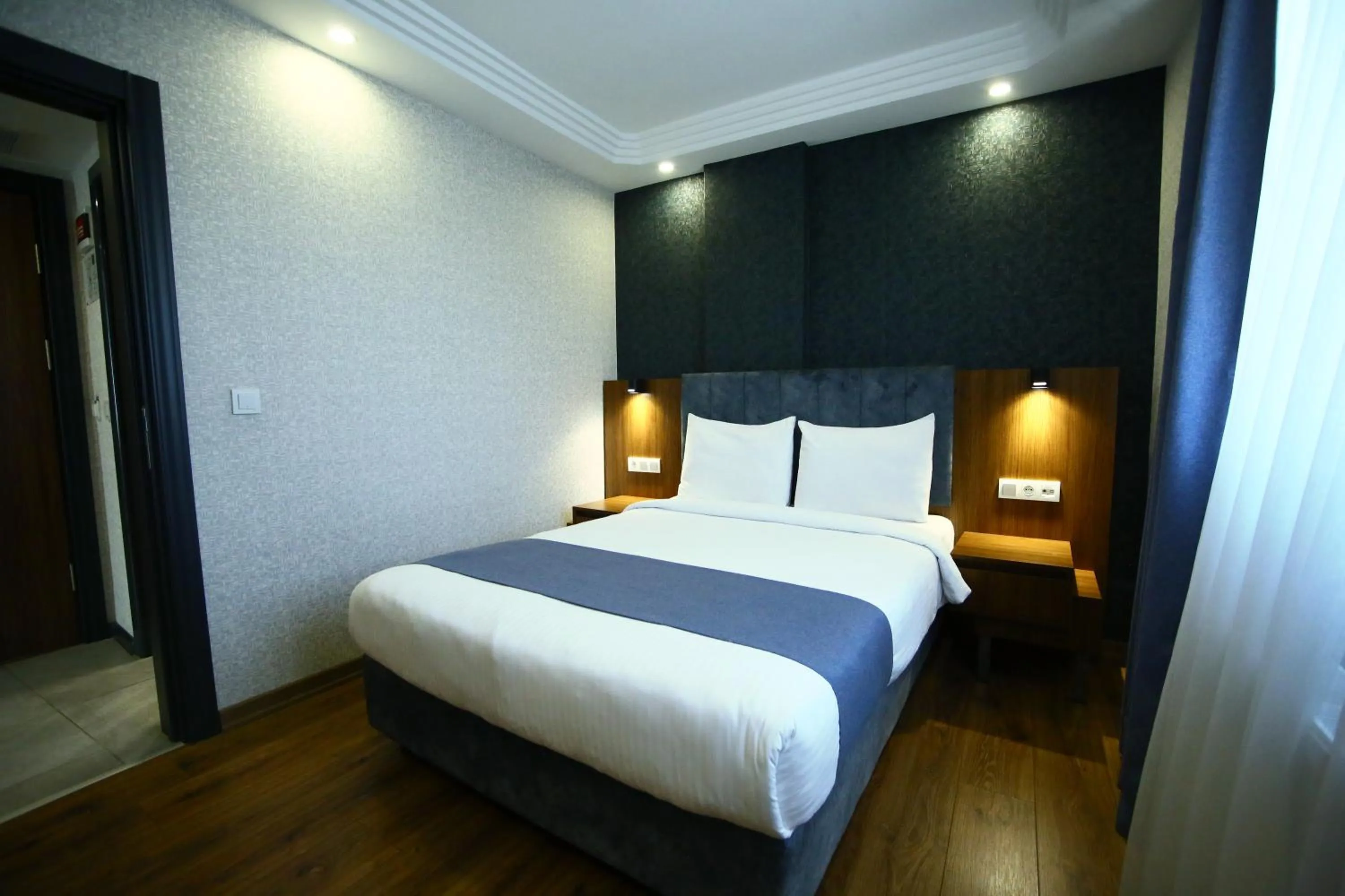 Bed in BUKAVİYYE HOTEL