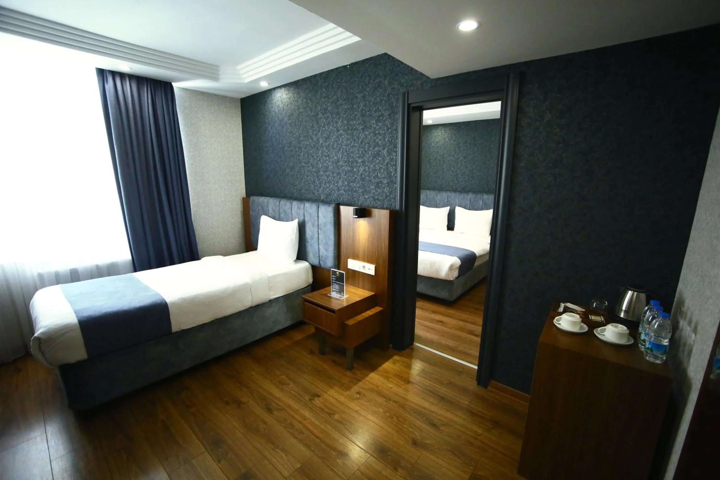 Bed in BUKAVİYYE HOTEL