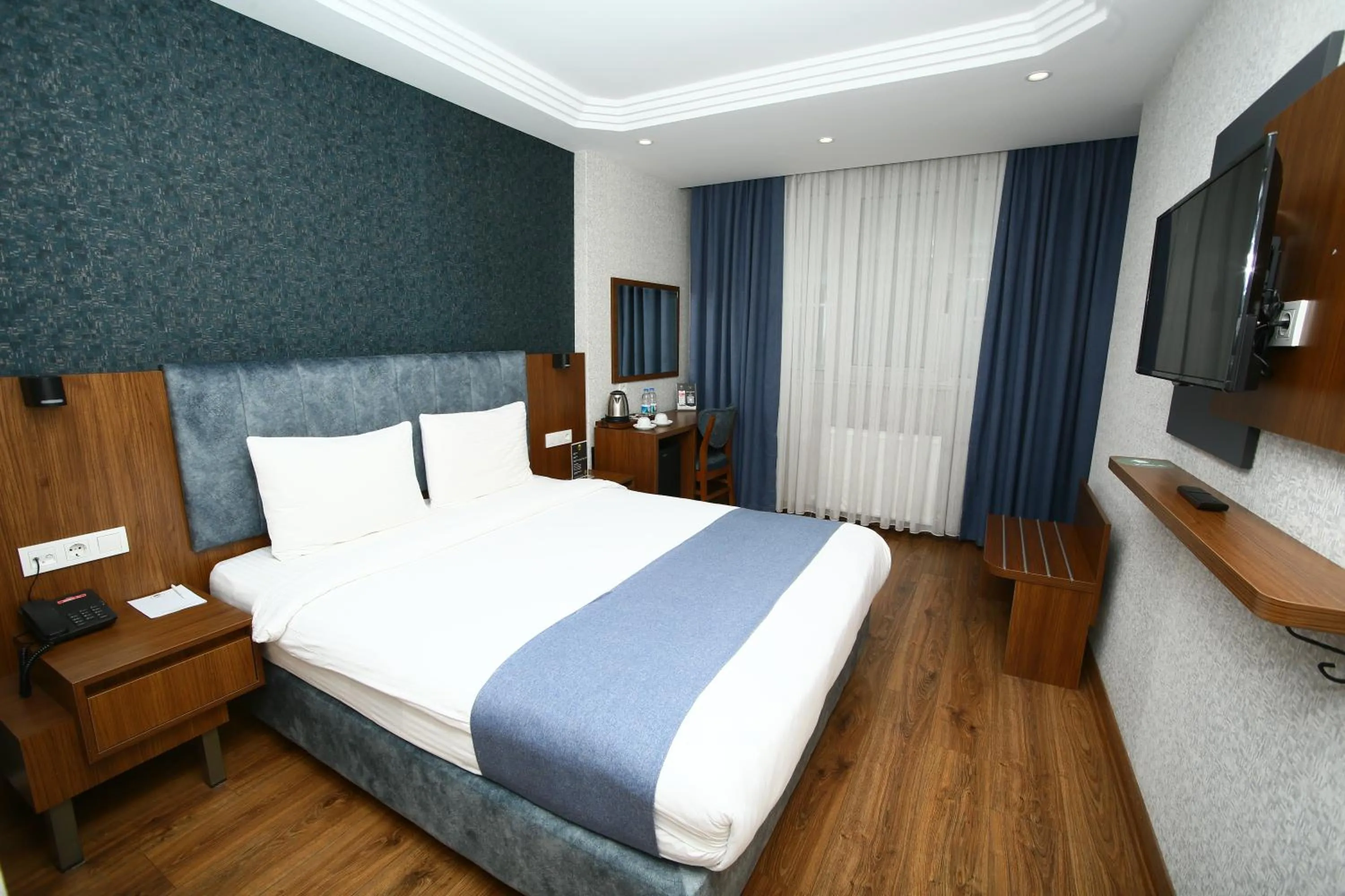 Bed in BUKAVİYYE HOTEL