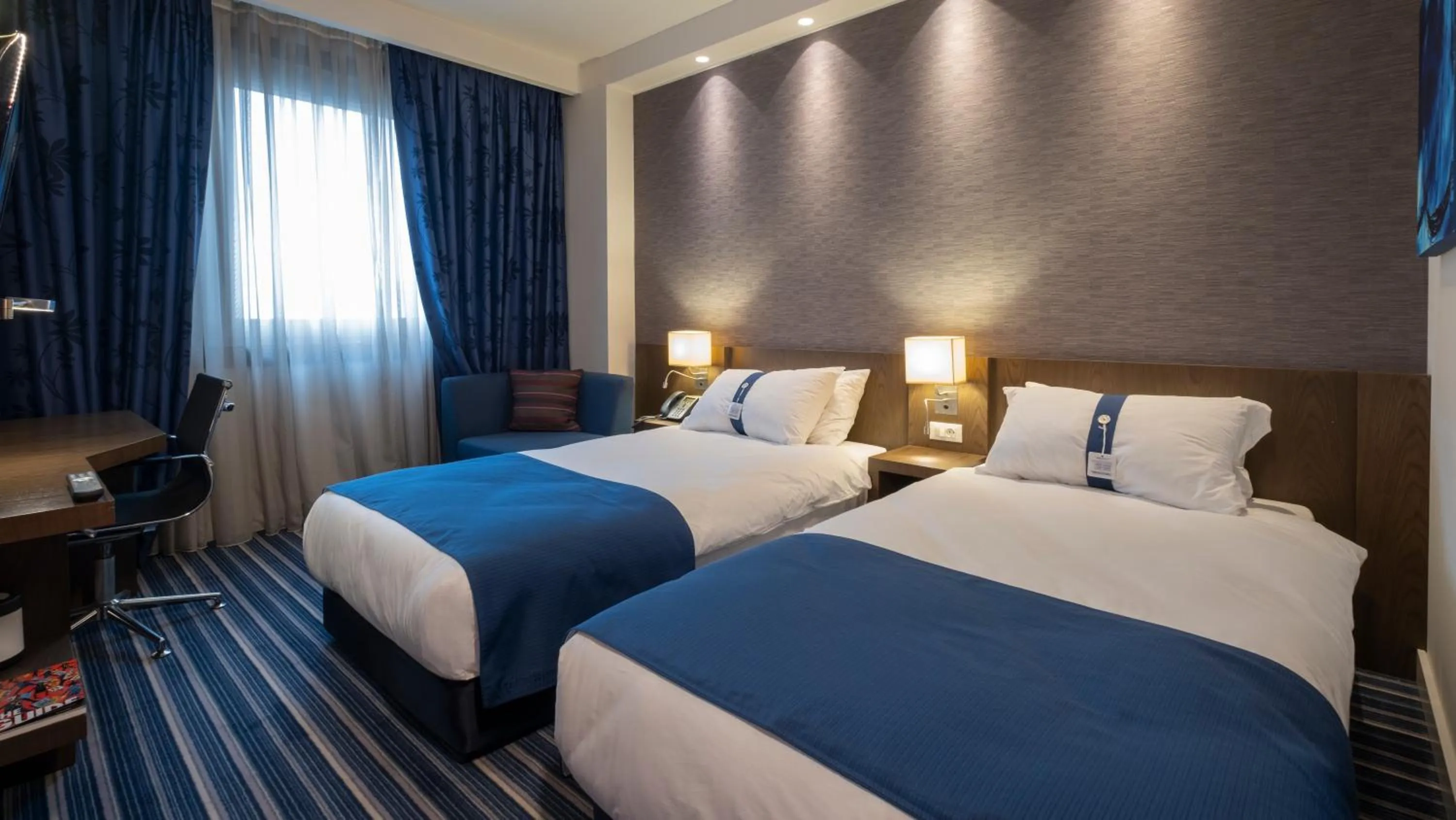 Bed in FEZ INN Hotel