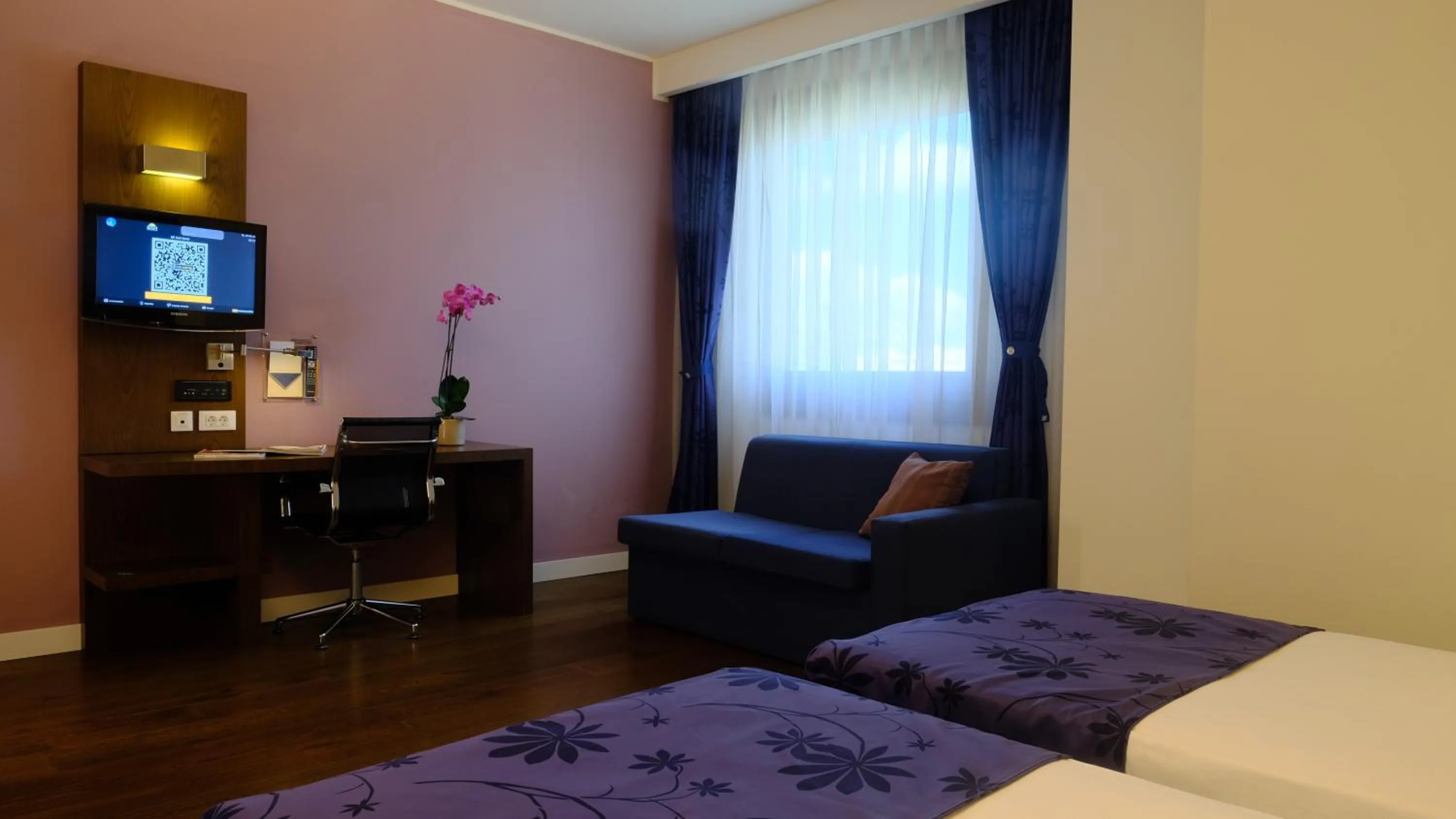 Bed in FEZ INN Hotel