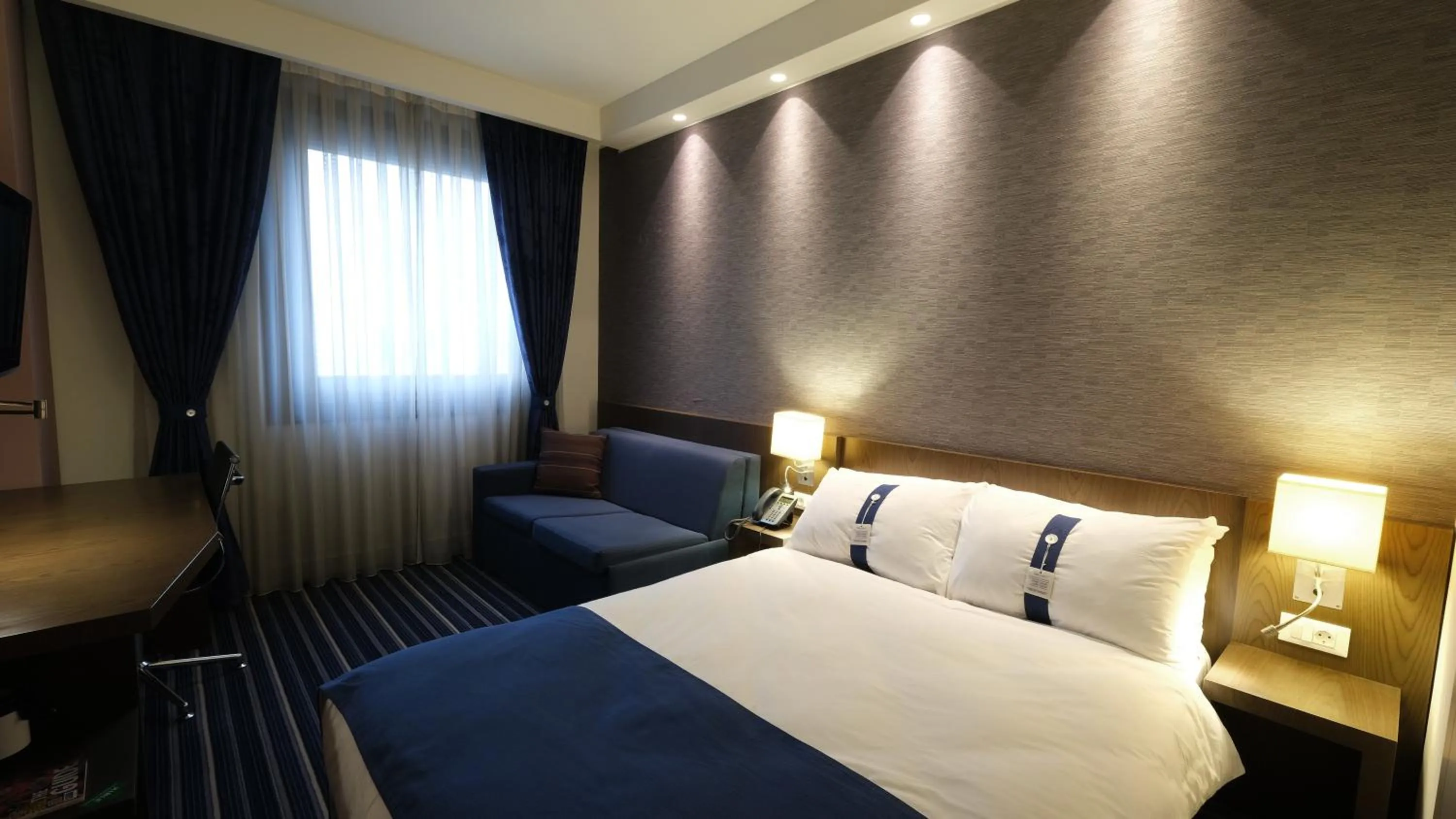 Bed in FEZ INN Hotel