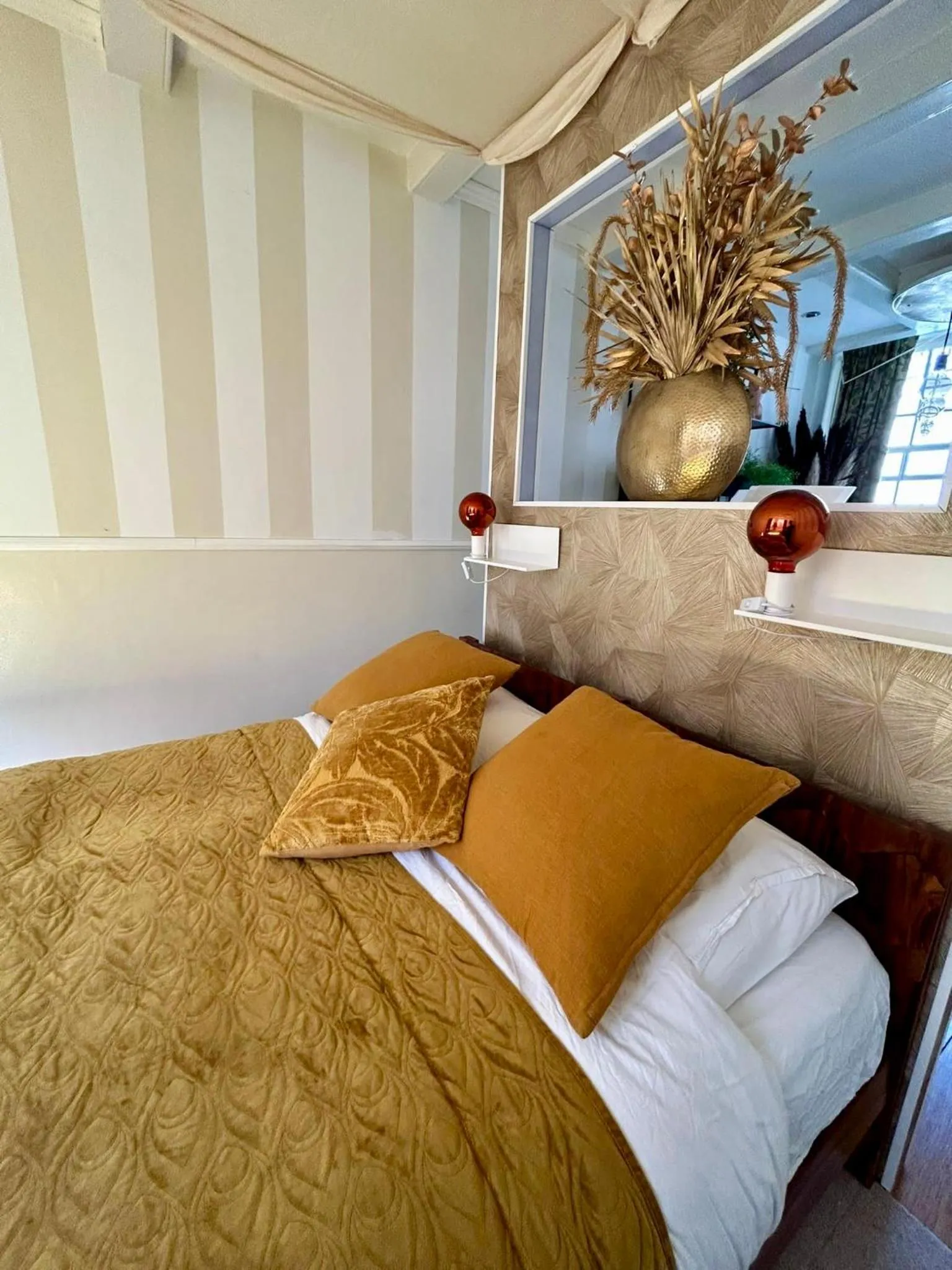 Bed in The Enlightened House Luxury Suites