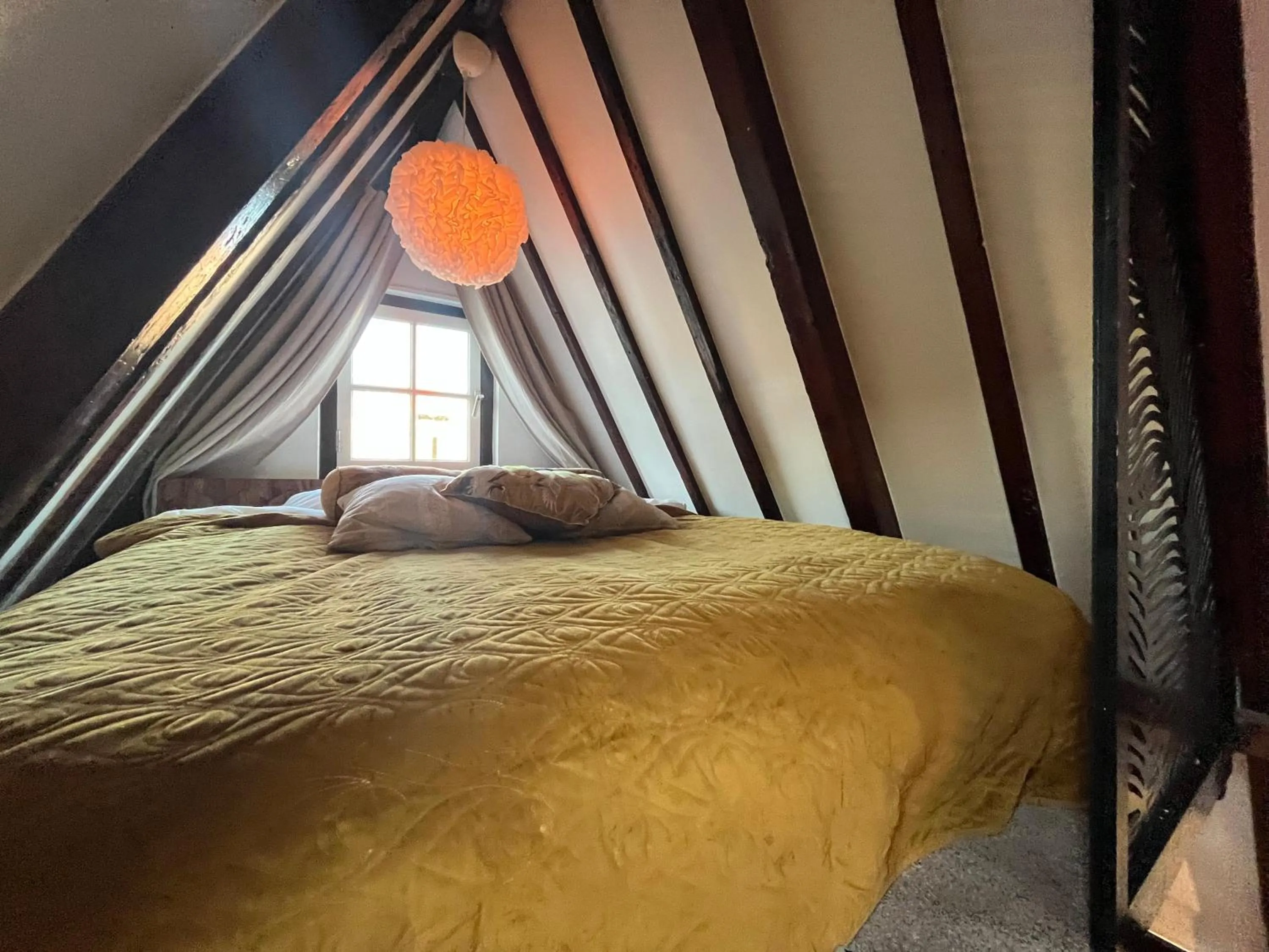 Bed in The Enlightened House Luxury Suites