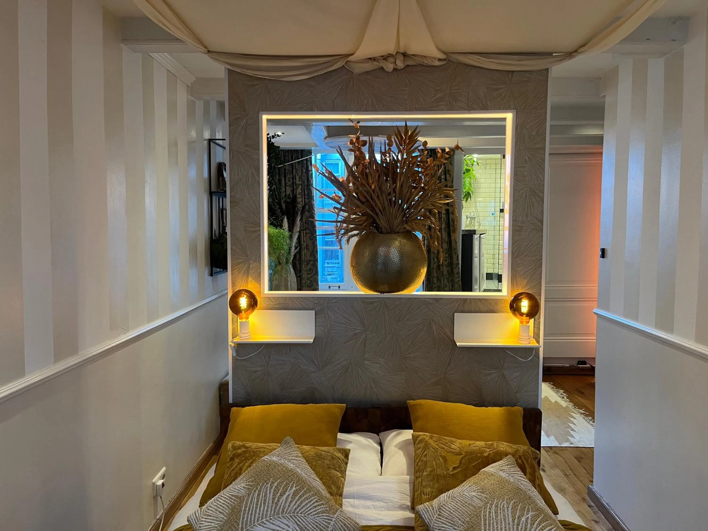 Bed in The Enlightened House Luxury Suites