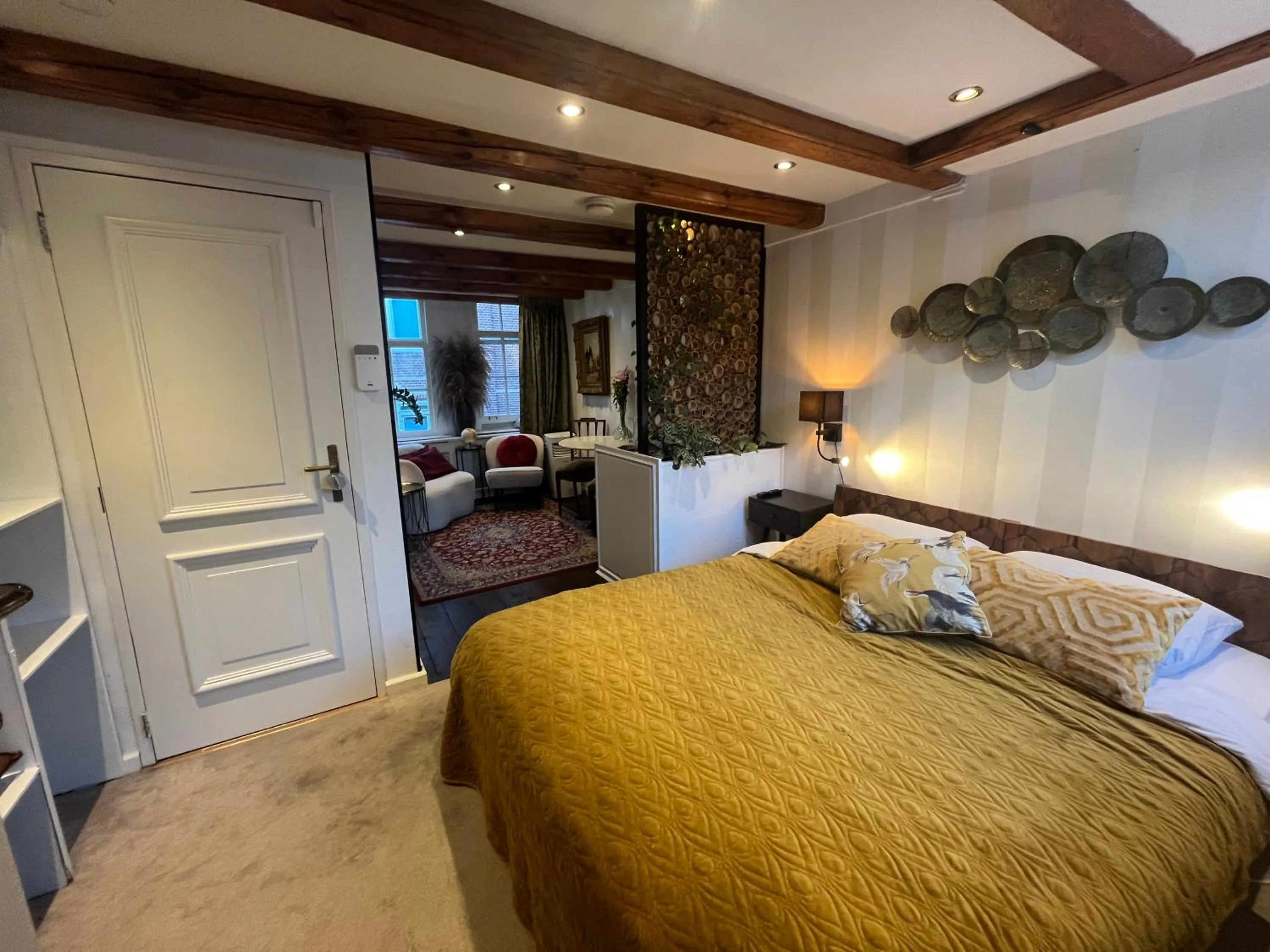 Bed in The Enlightened House Luxury Suites