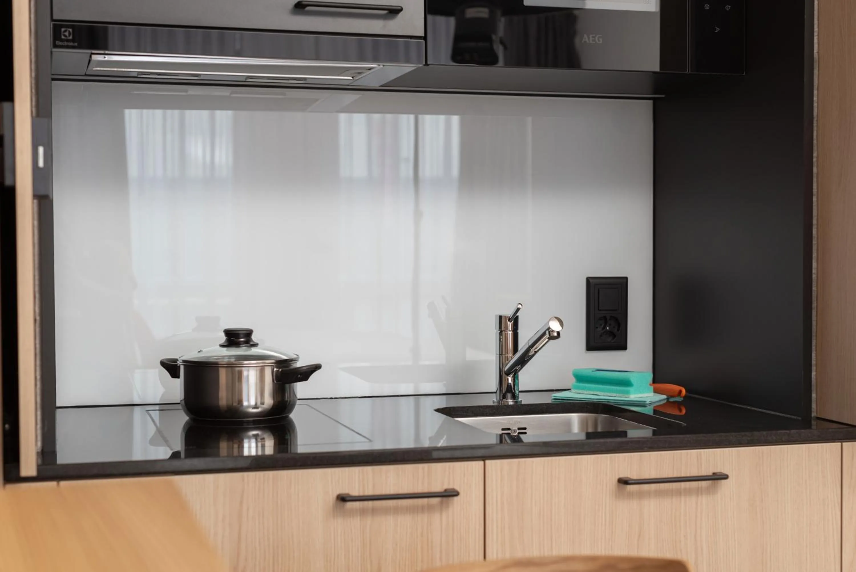 Kitchen or kitchenette in Tailormade Hotel BAB Bachenbülach