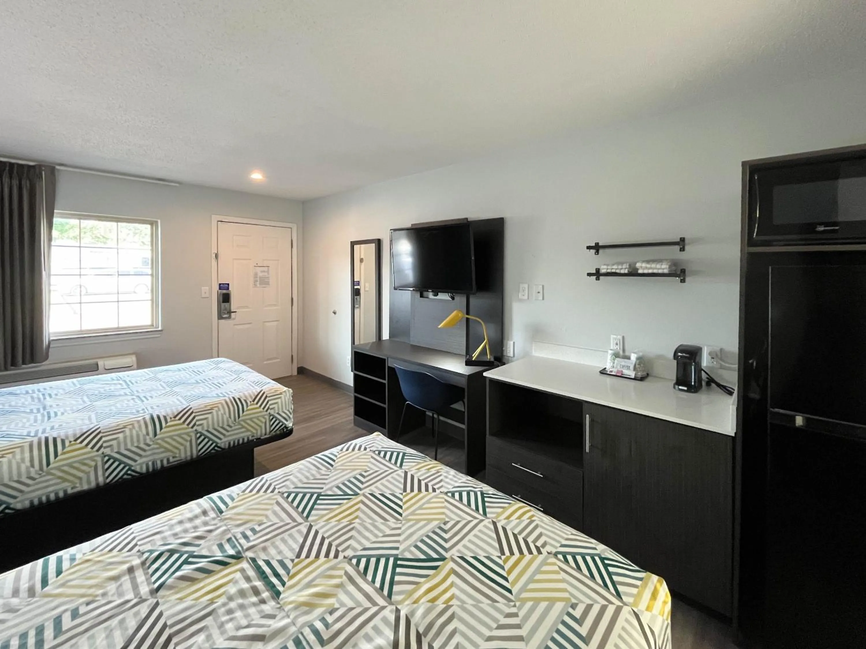 Kitchen or kitchenette, Bed in Studio 6 Suites - Lafayette, IN
