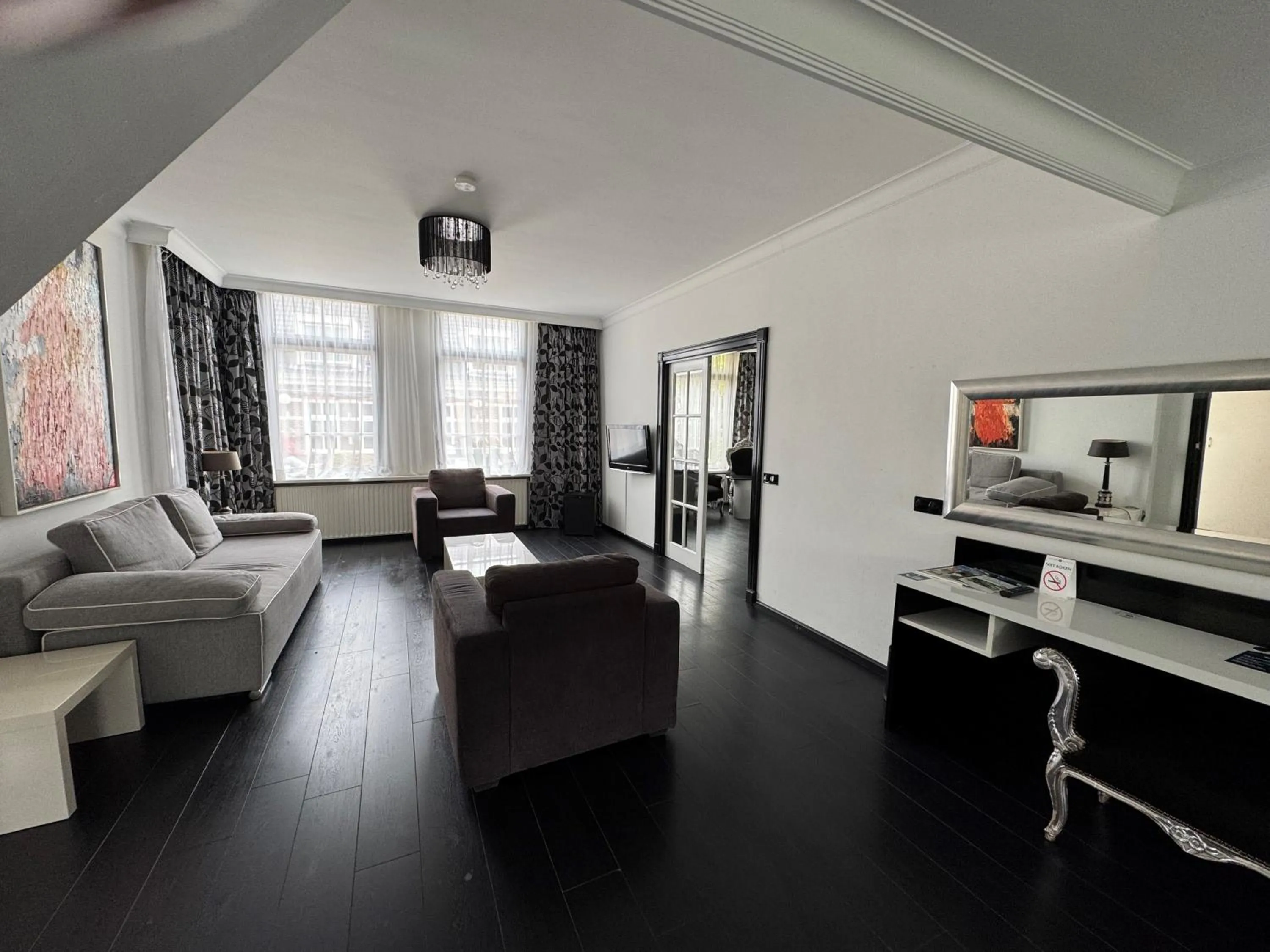 Living room, Bed in Fletcher Hotel Restaurant Marijke