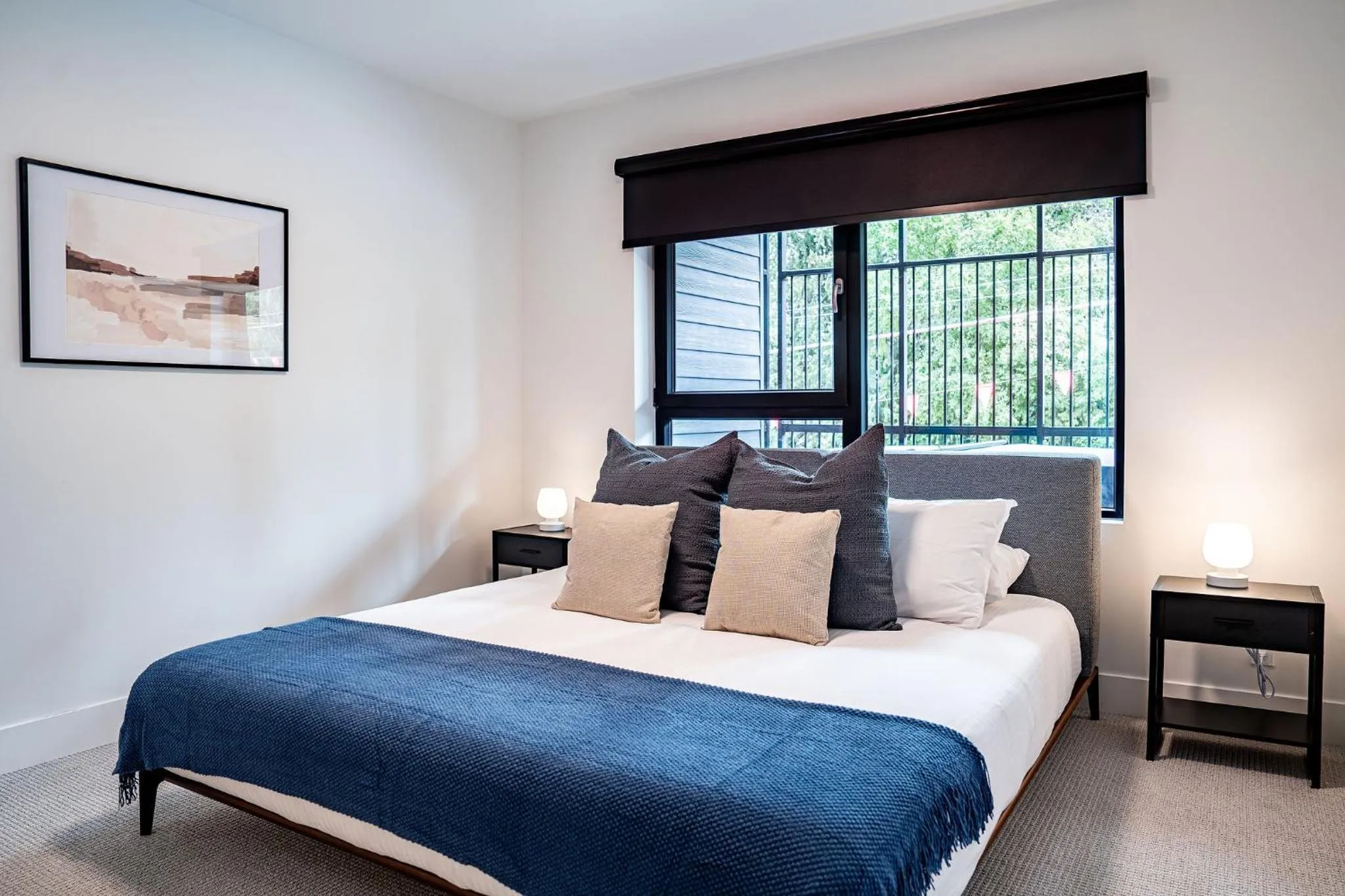 Bed in Serenity Now by Revelstoke Vacations