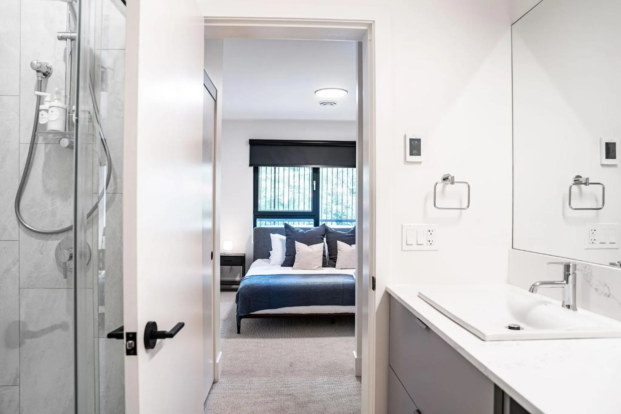 Bed in Serenity Now by Revelstoke Vacations