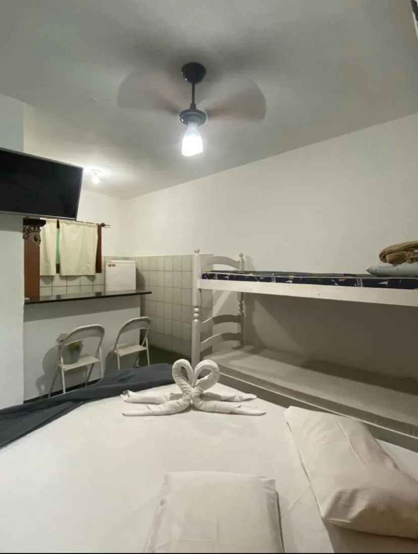 Bed in Pousada Recanto das Tartarugas