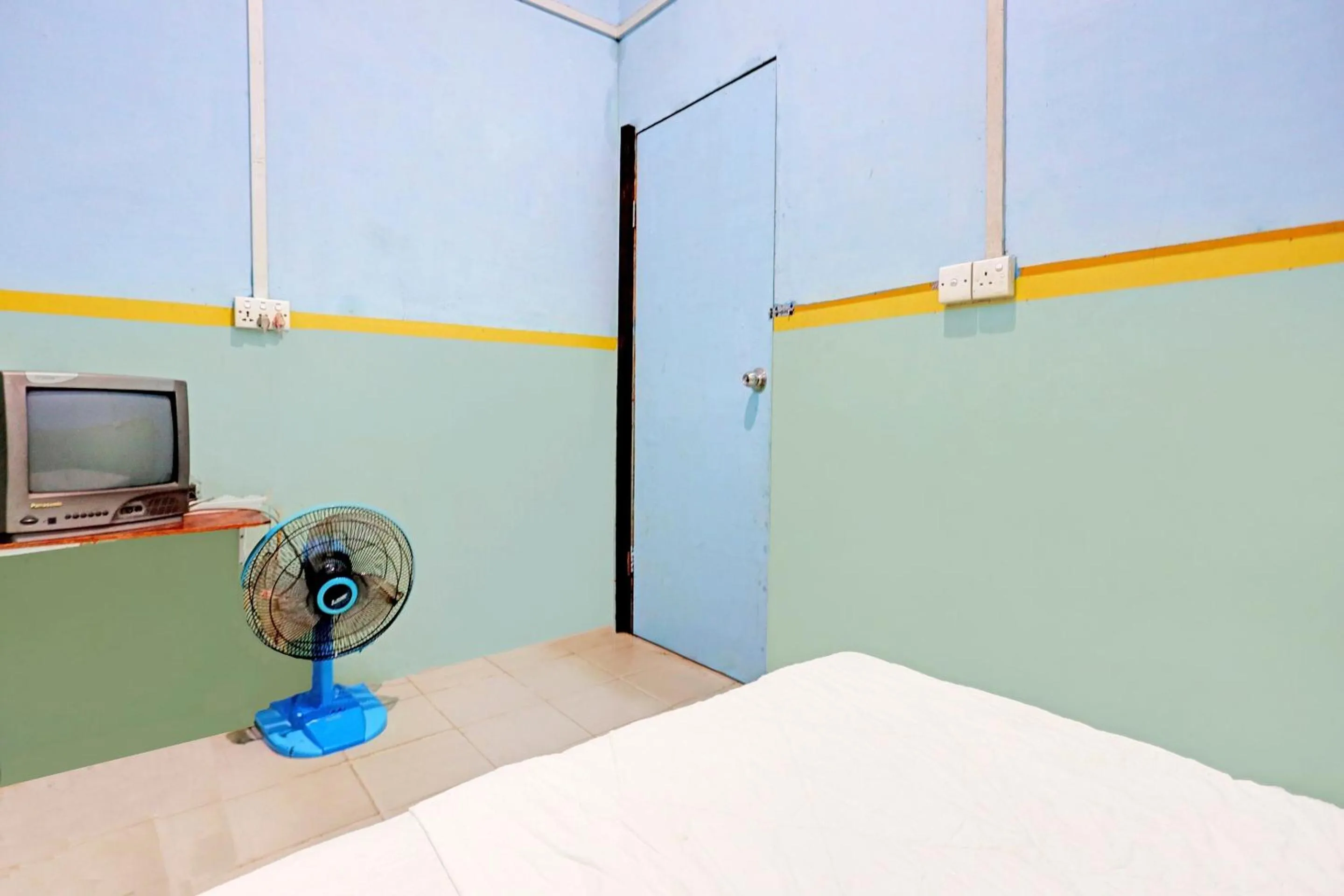 Bedroom in Hotel O Toyo Homestay Syariah