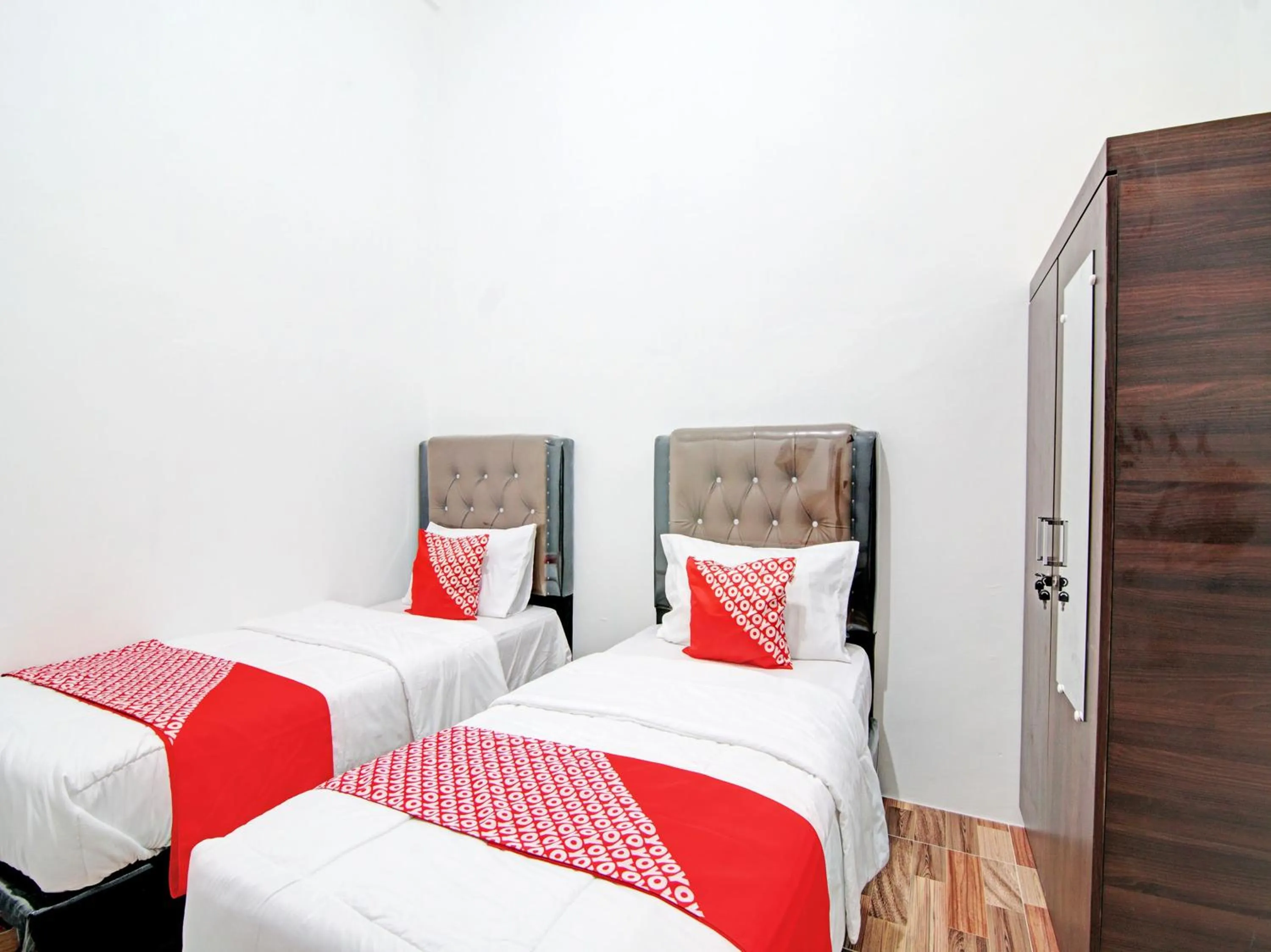 Delxue Twin Room in OYO 92946 Dekna Homestay Syariah