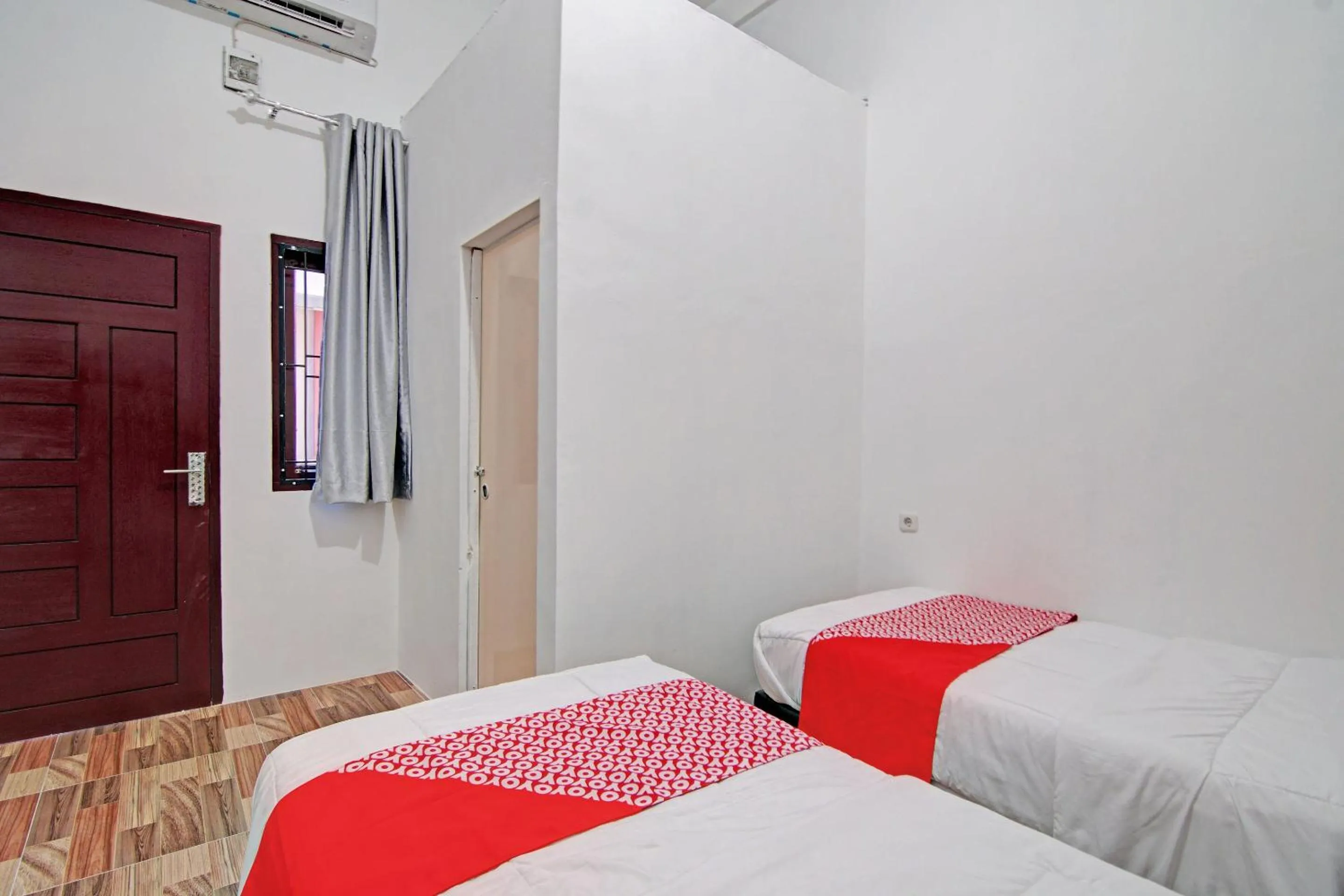 Bedroom in OYO 92946 Dekna Homestay Syariah