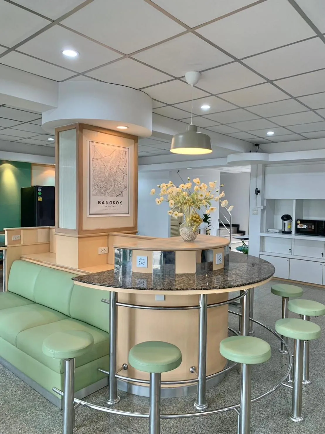 Communal lounge/ TV room in Marni BKK Hostel