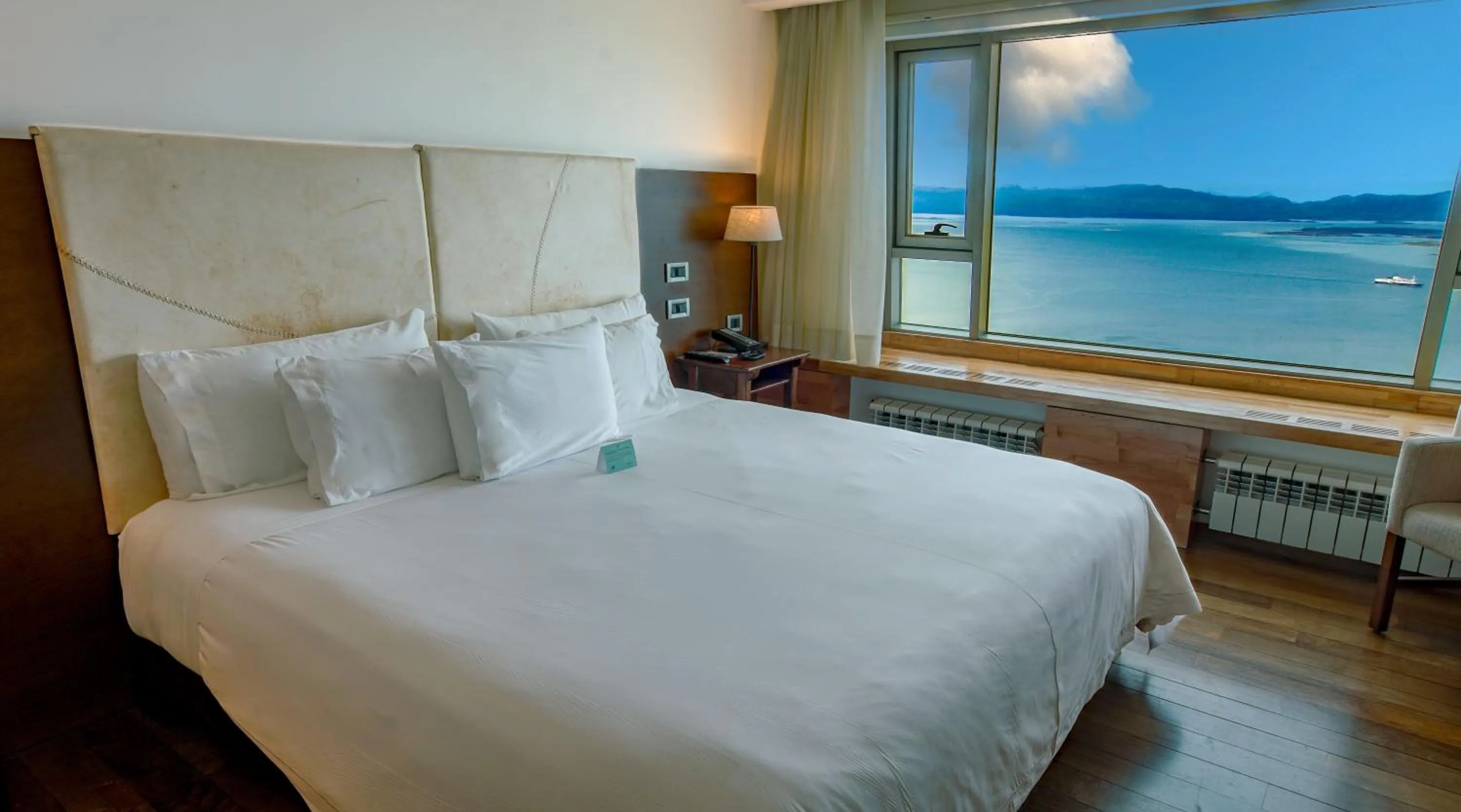 Bed in Arakur Ushuaia Resort & Spa