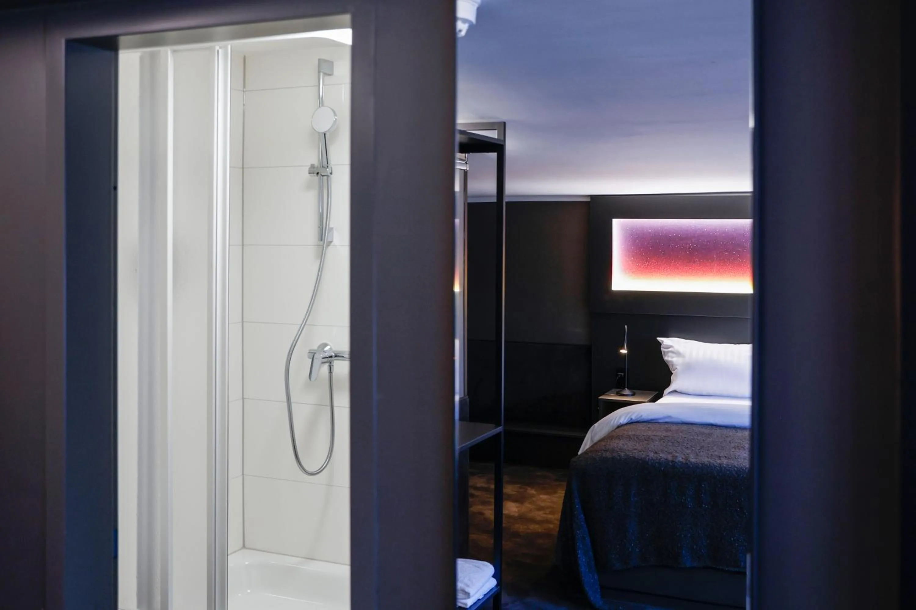 Bathroom, Bed in Sleephotels Cosmos