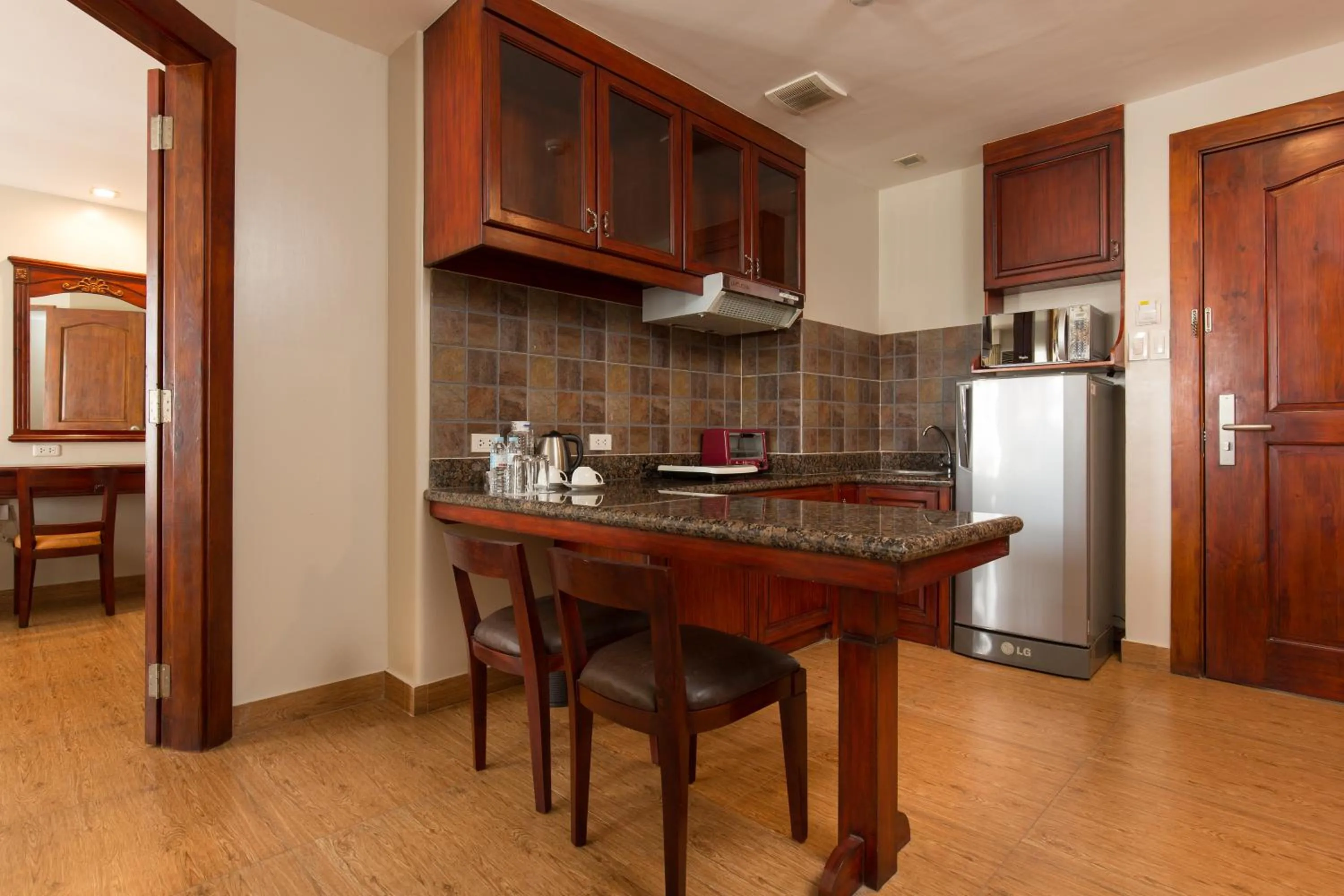 Kitchen or kitchenette in MJ Hotel and Suites