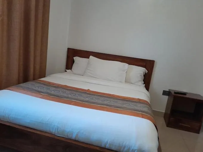 Bed in Infinity Hotel Kampala