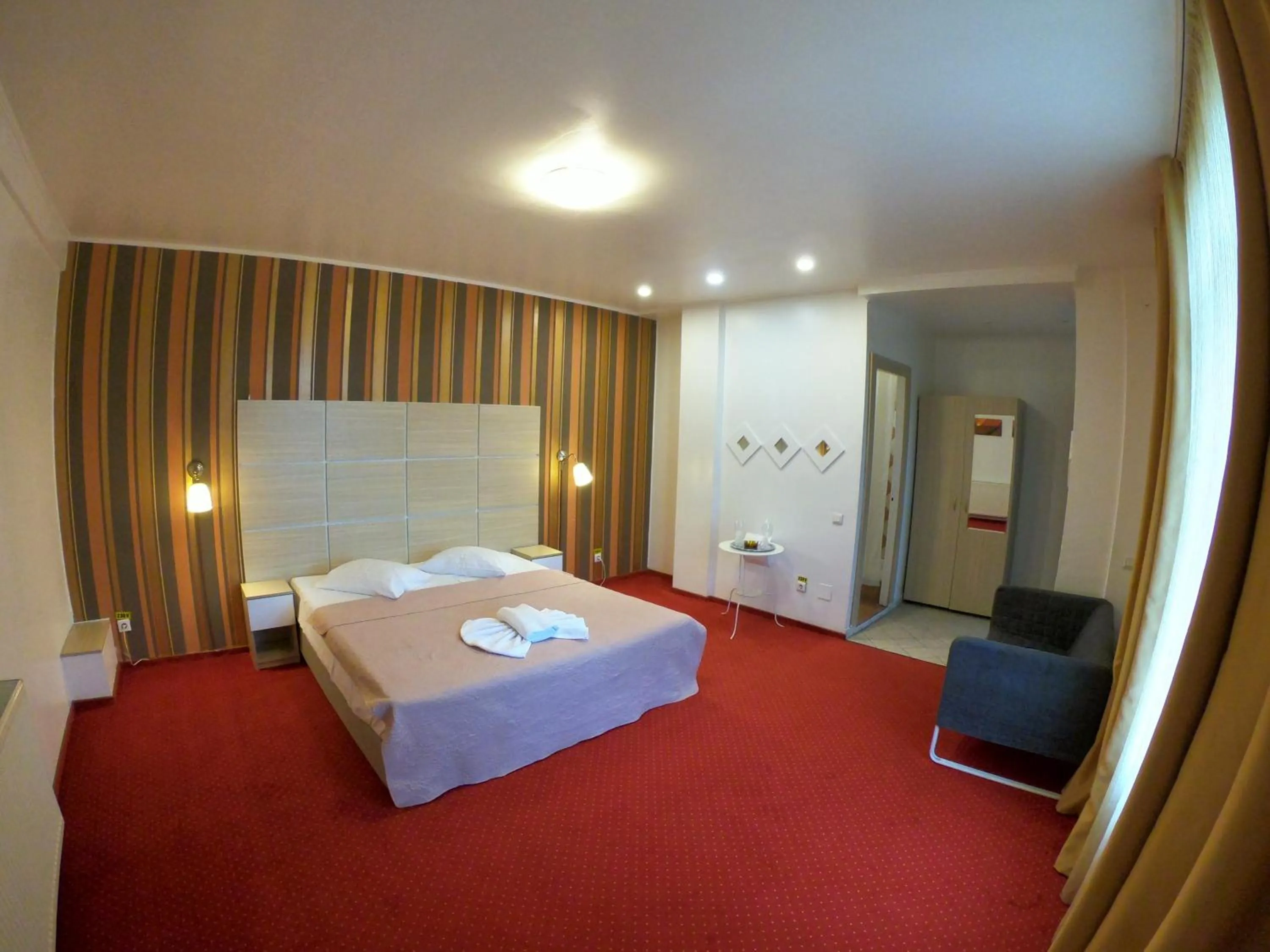 Bed in Hotel Mon Caprice