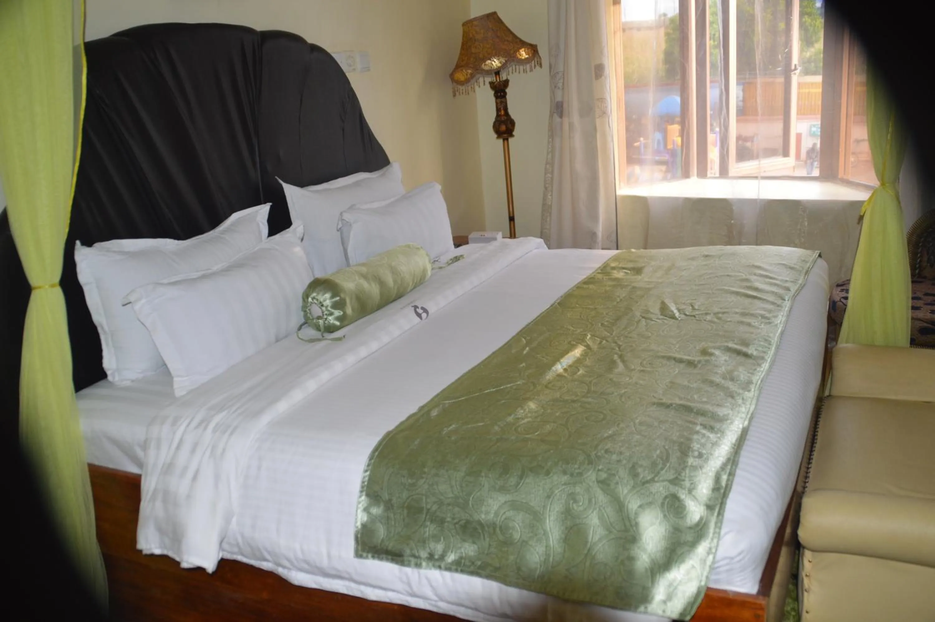 Bed in Aturukan Hotel