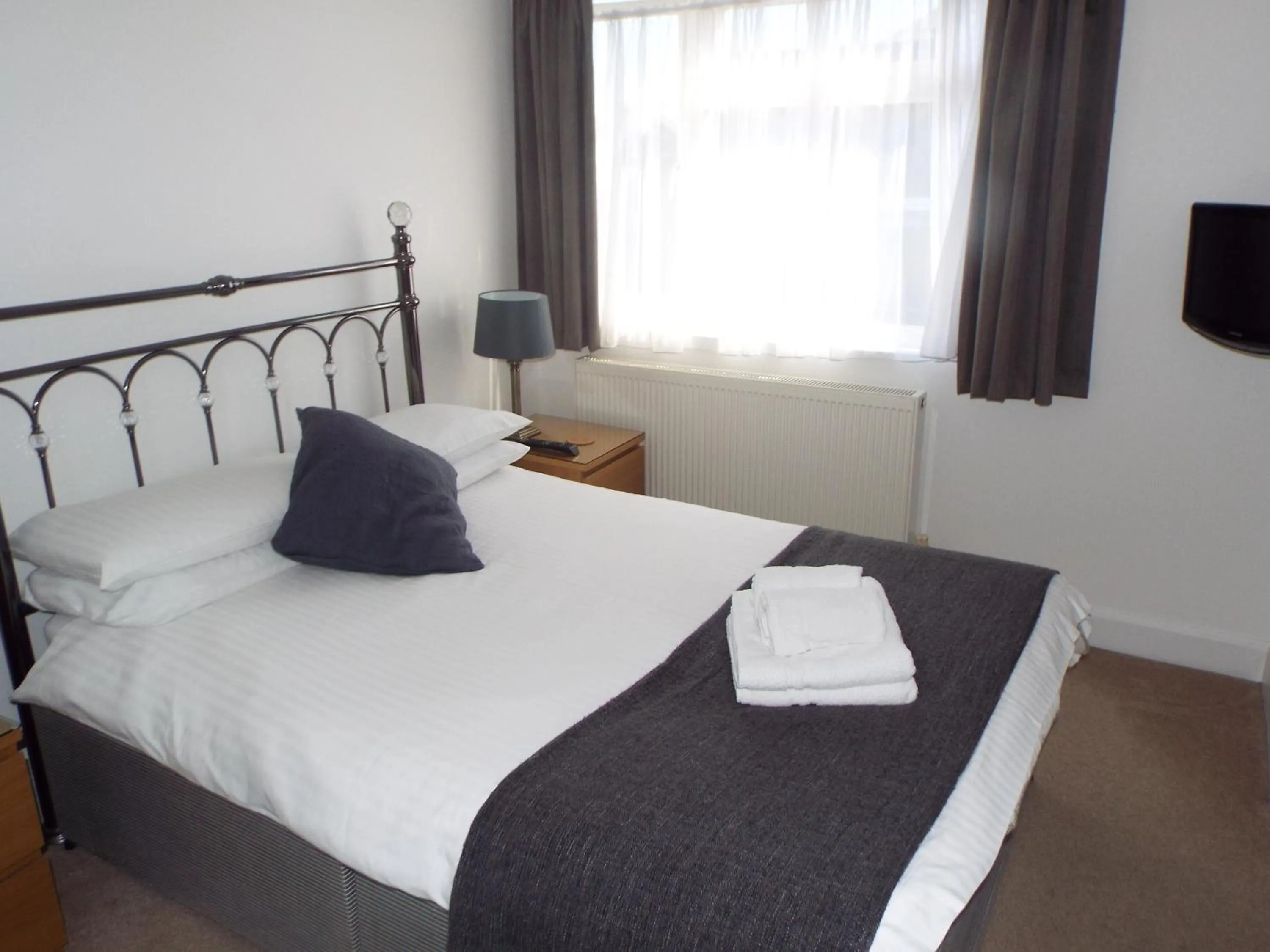 Photo of the whole room, Bed in The Westby