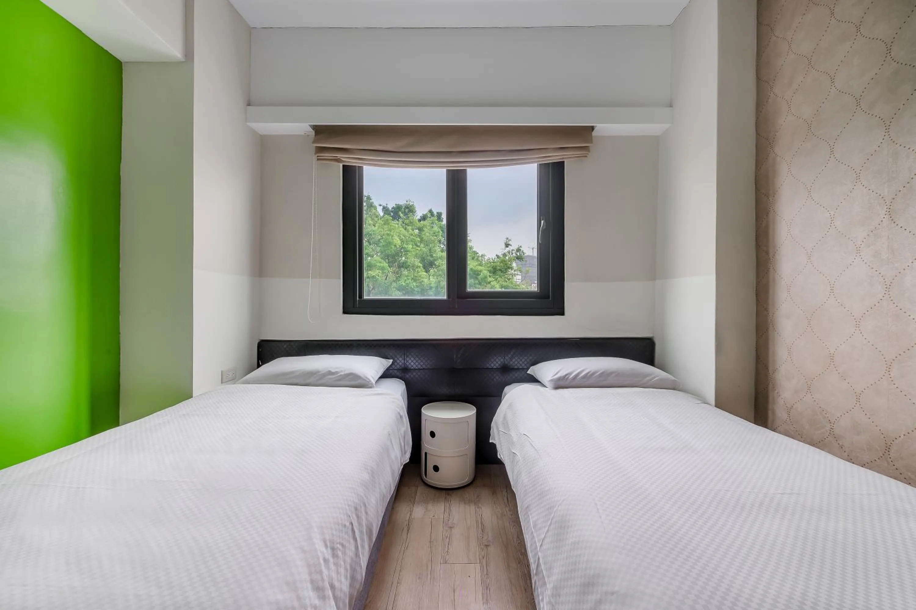 Bed in CHECK inn Express Kaohsiung Love River