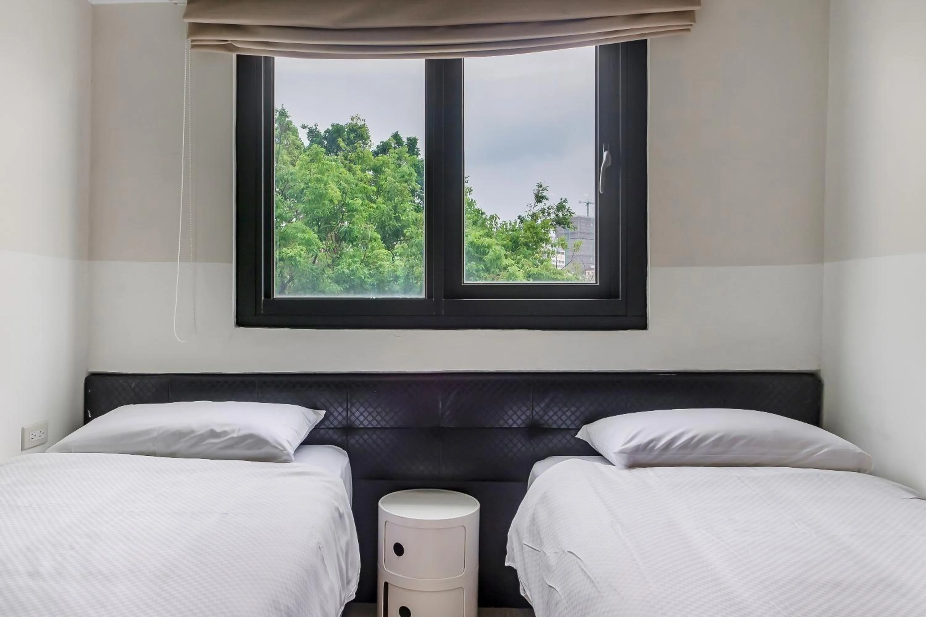 Bed in CHECK inn Express Kaohsiung Love River