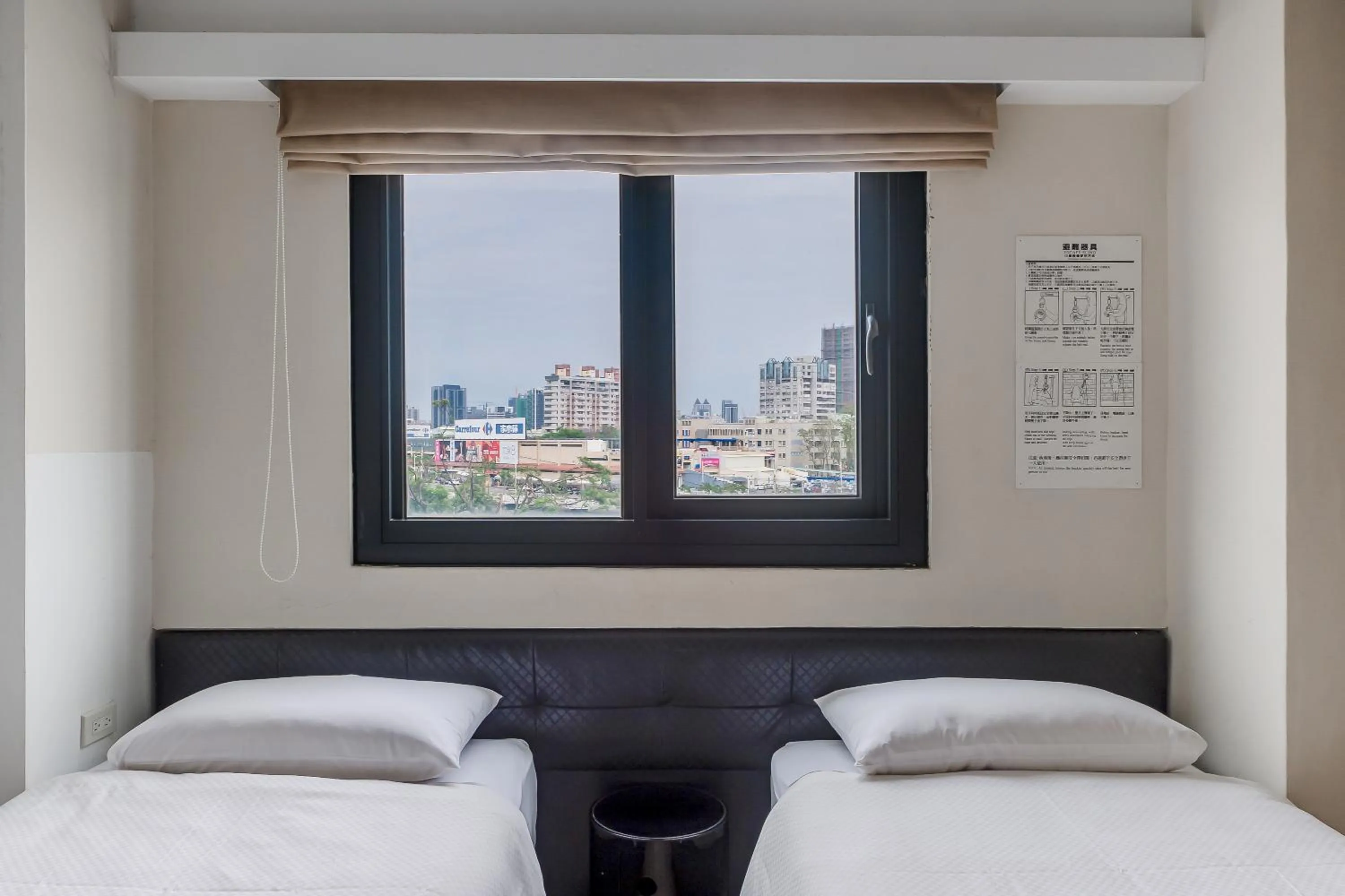 Bed in CHECK inn Express Kaohsiung Love River