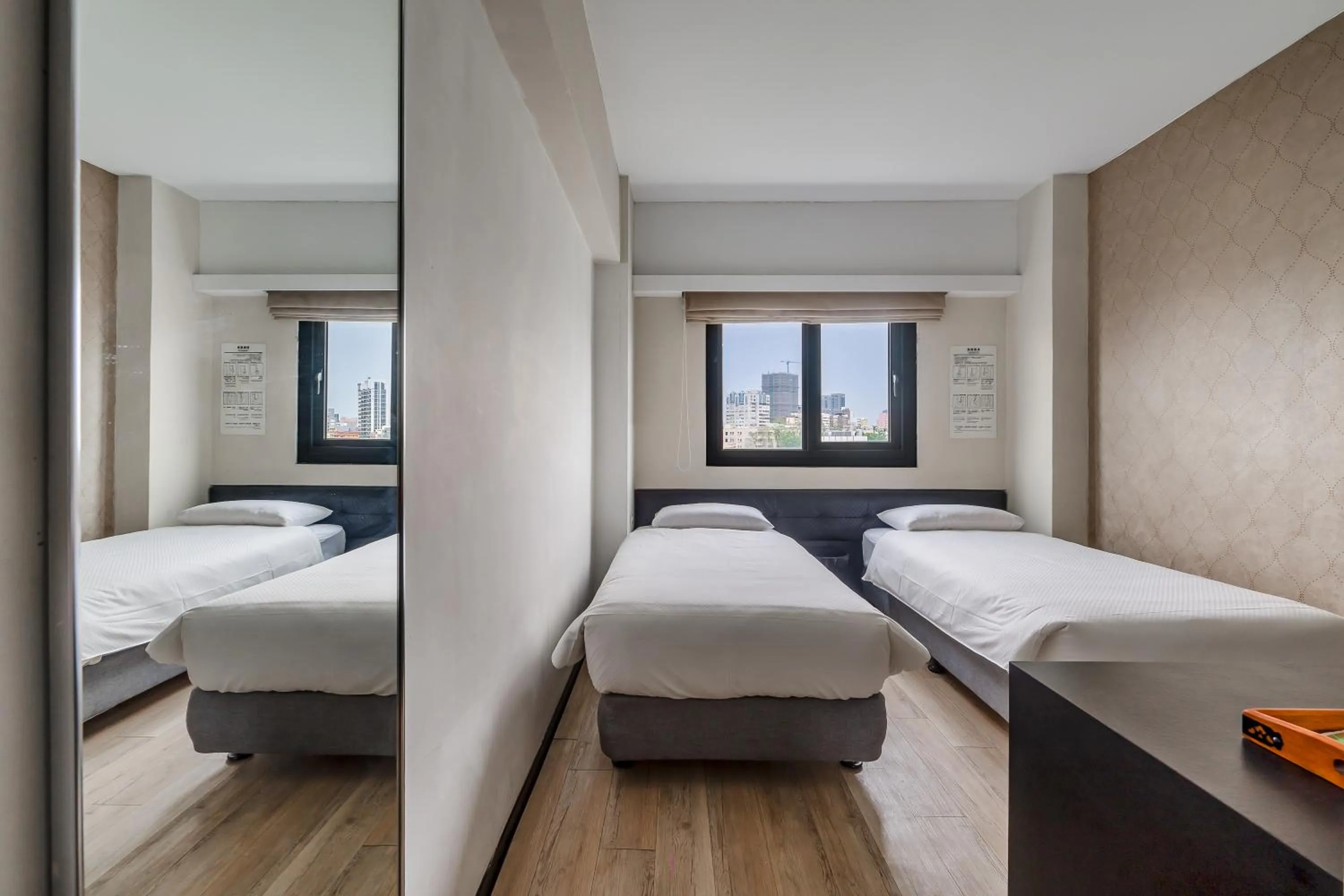 Bed in CHECK inn Express Kaohsiung Love River