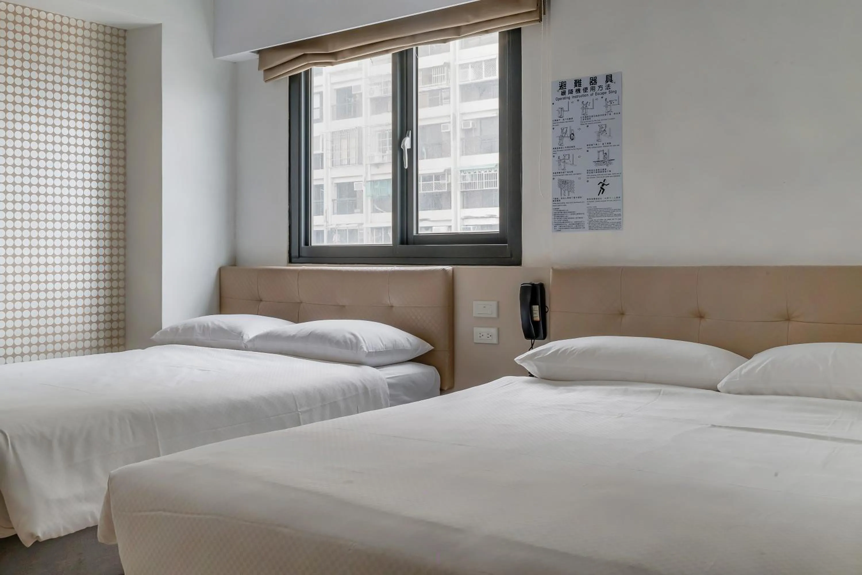 Bed in CHECK inn Express Kaohsiung Love River