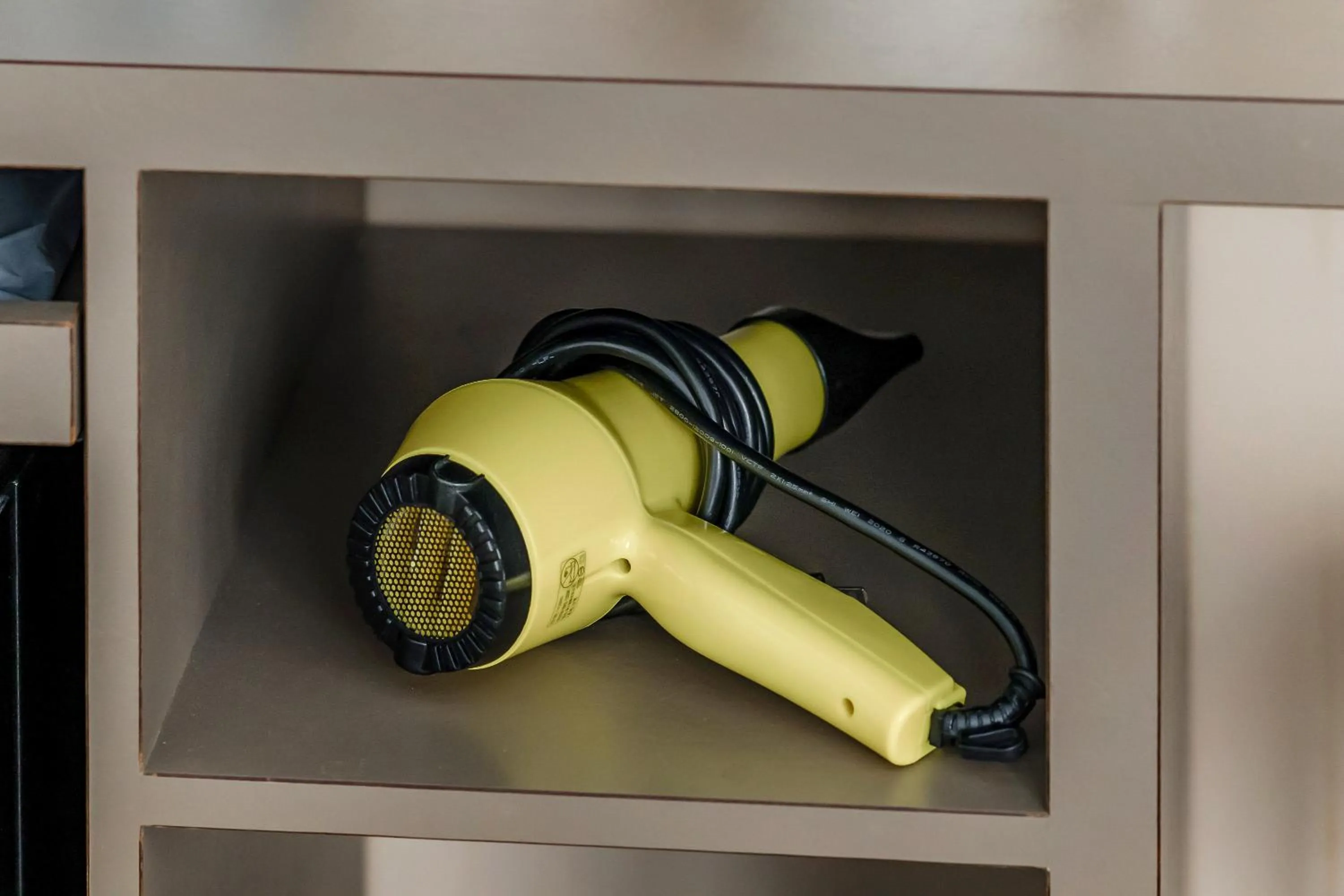 hair dryier in CHECK inn Express Kaohsiung Love River