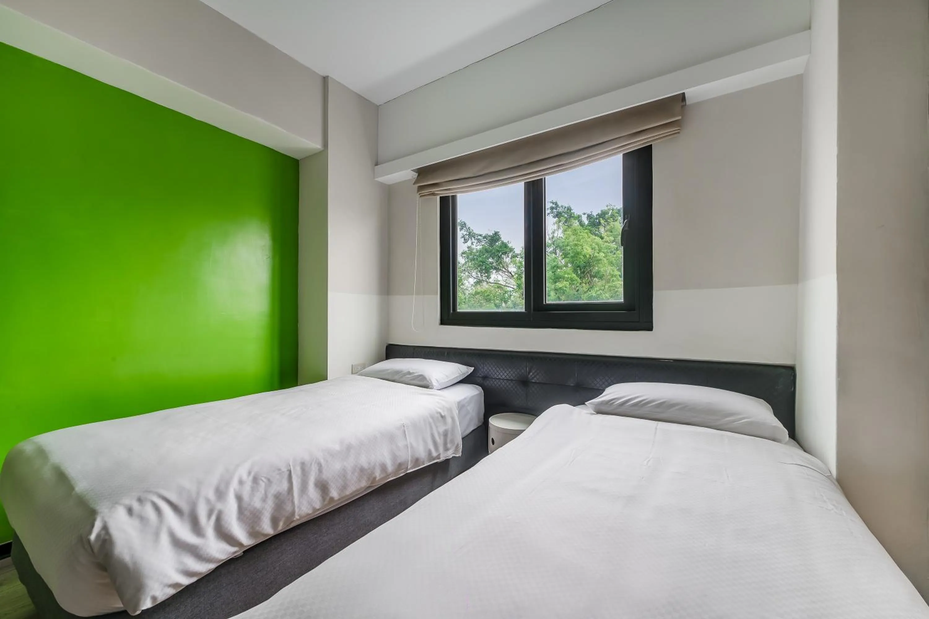 Bed in CHECK inn Express Kaohsiung Love River