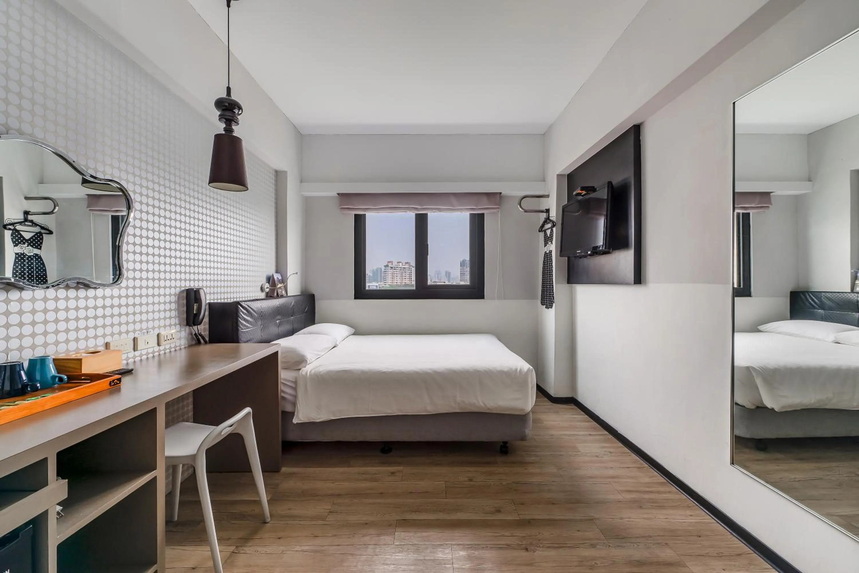 Bed in CHECK inn Express Kaohsiung Love River