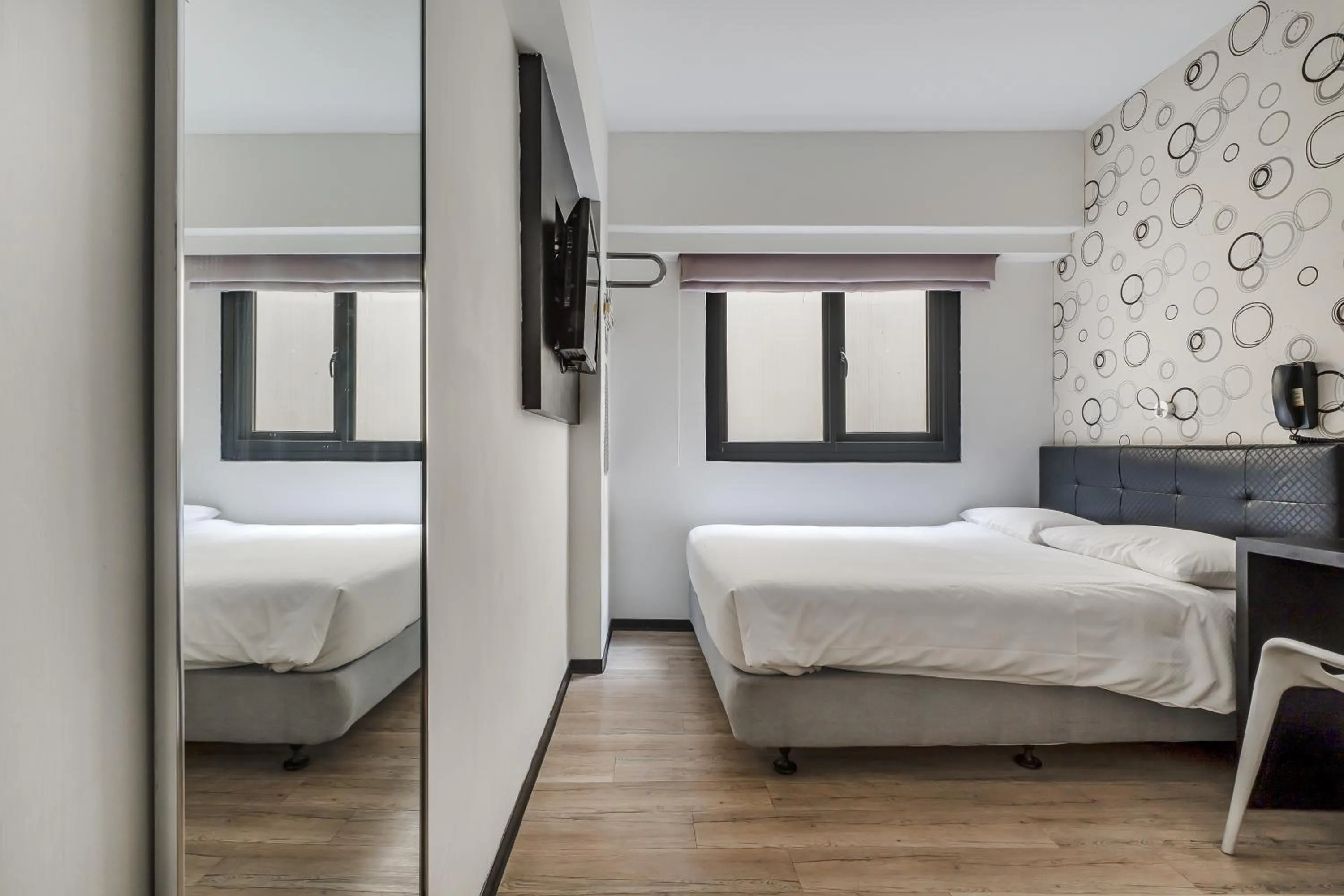 Bed in CHECK inn Express Kaohsiung Love River