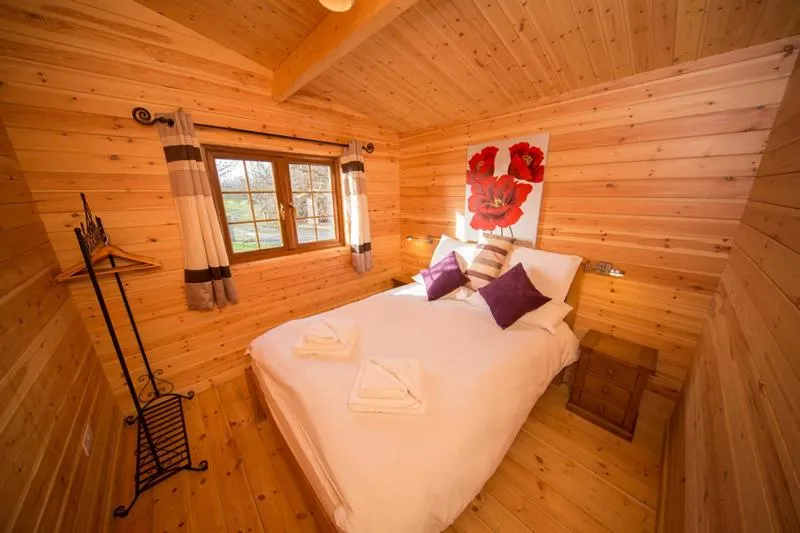 Bed in Wall Eden Farm - Luxury Log Cabins and Glamping