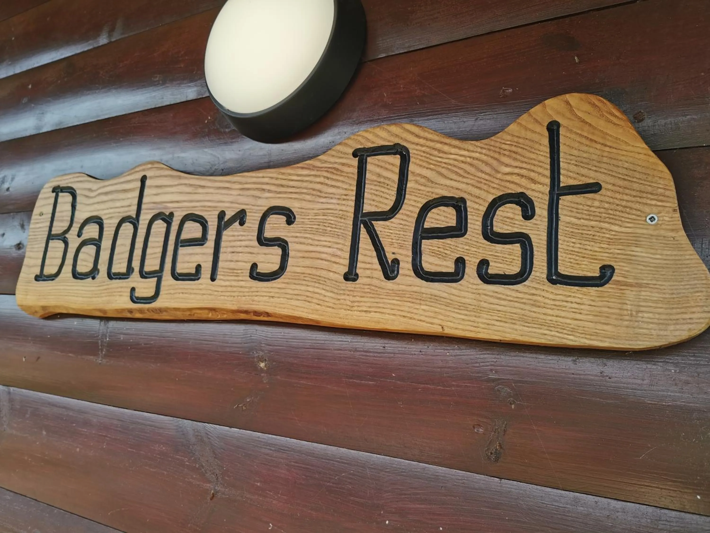 Property logo or sign in Wall Eden Farm - Luxury Log Cabins and Glamping