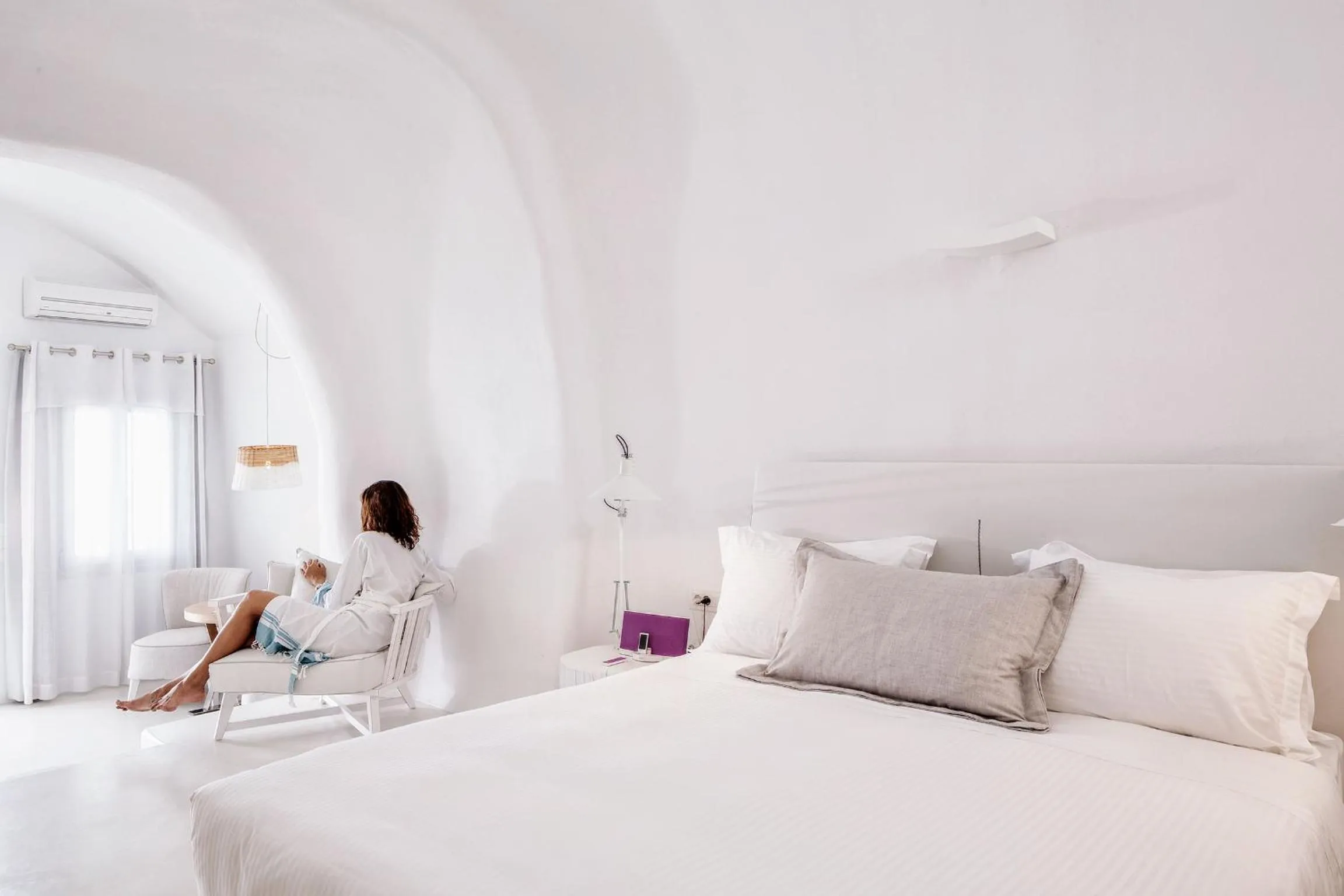 Seating area, Bed in Charisma Suites