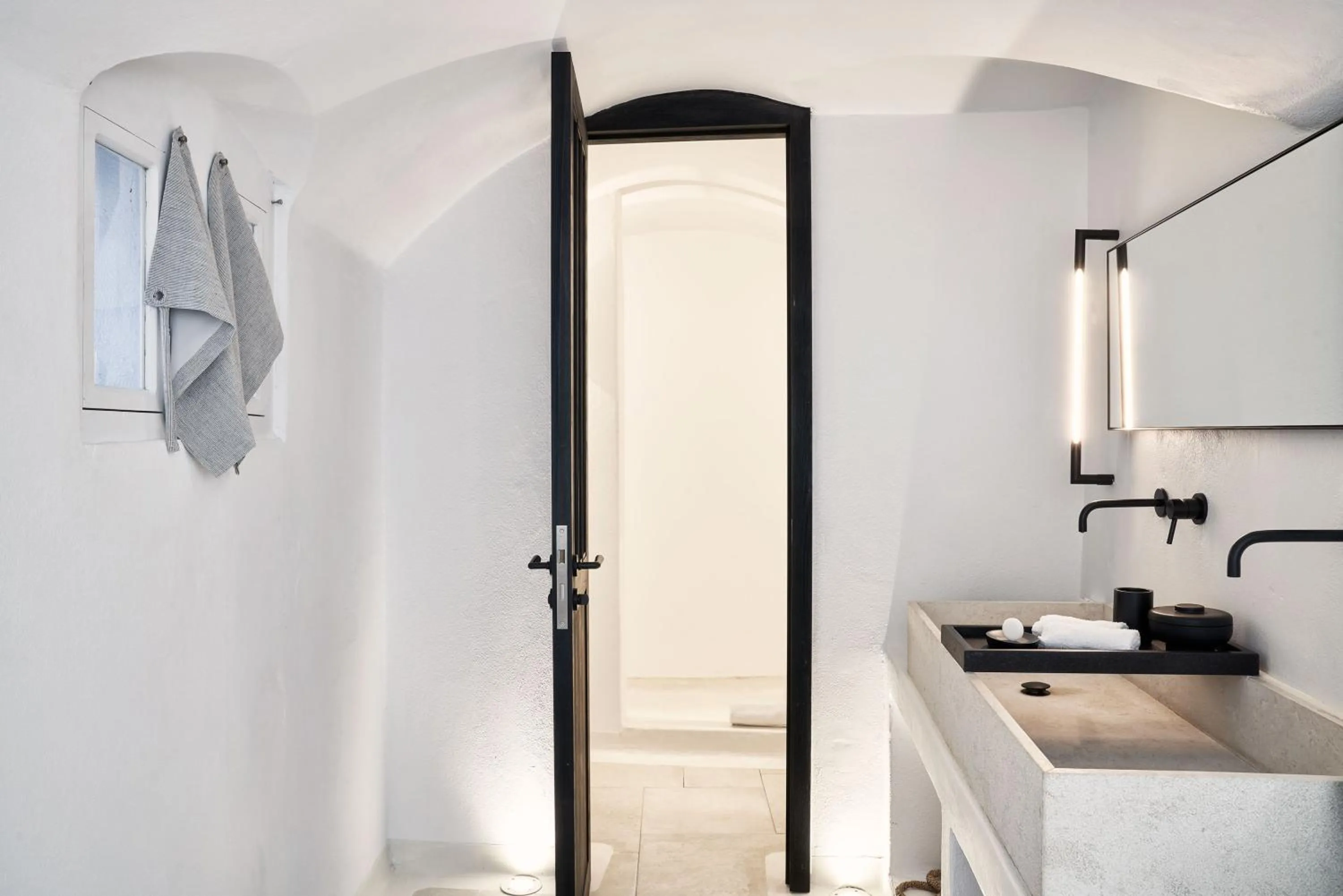 Bathroom in Charisma Suites